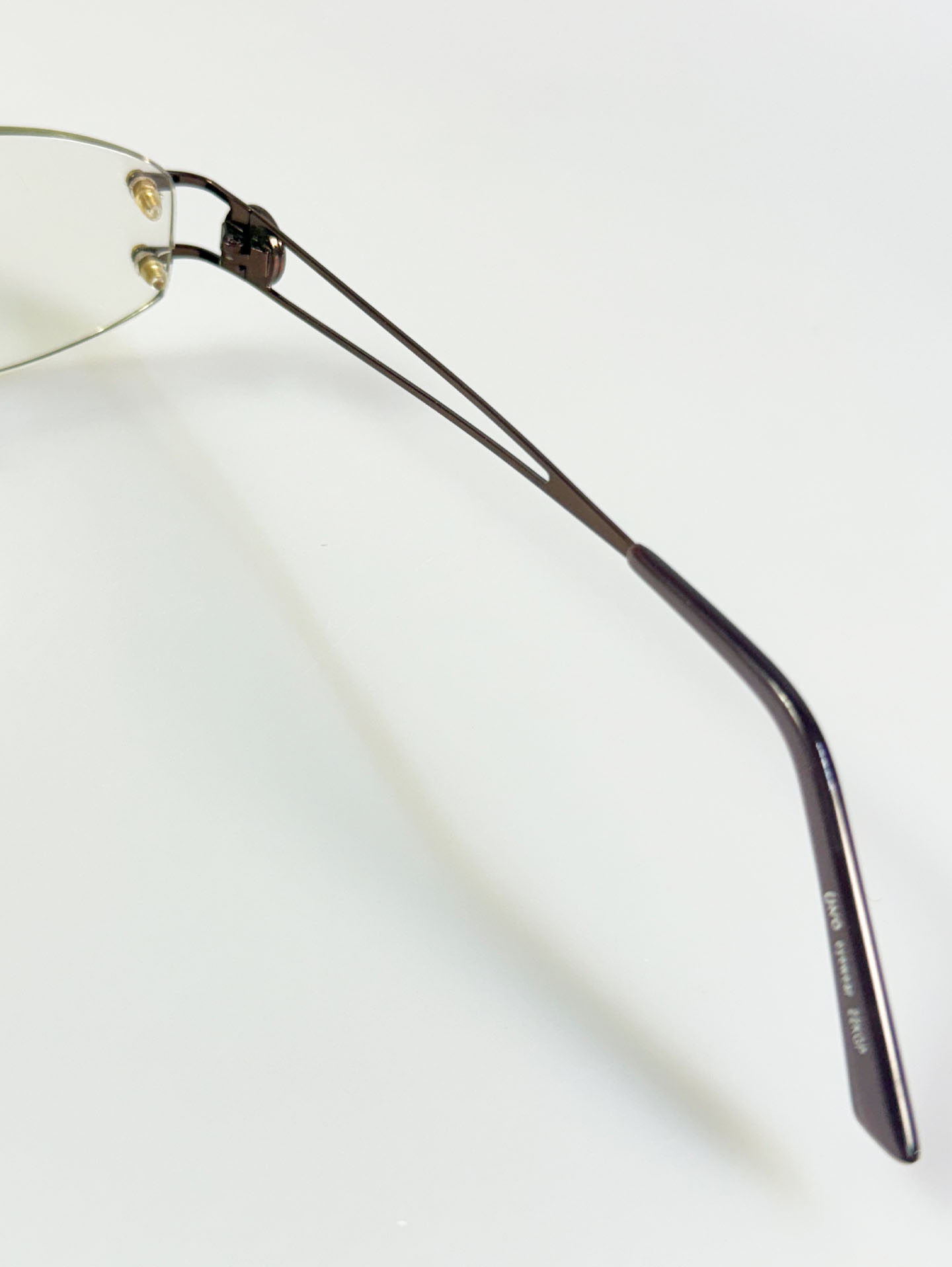 UNO Brown Rimless Oval Metal Glasses