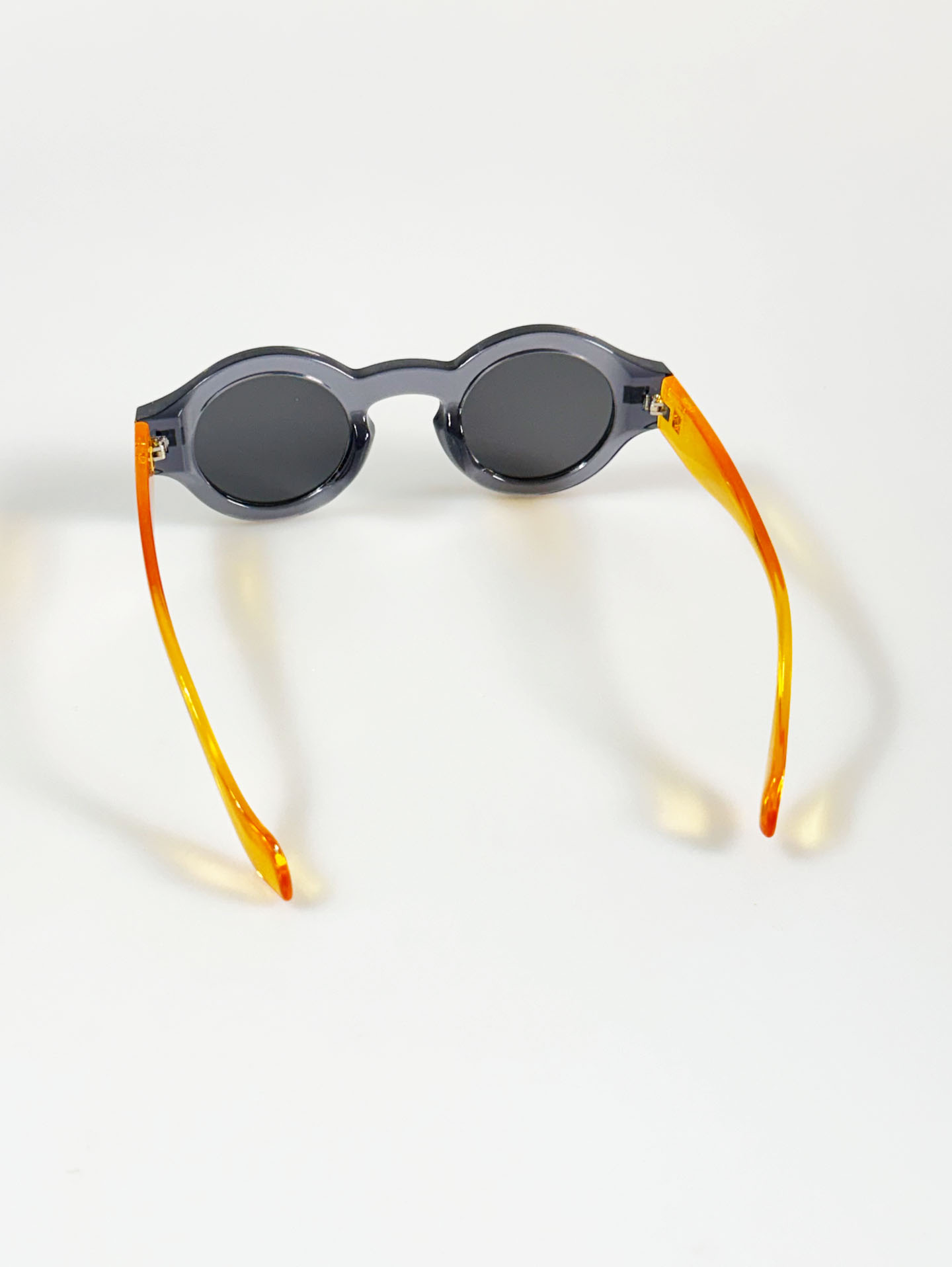 Smoke Gray & Amber Two-Tone Bold Round Sunglasses