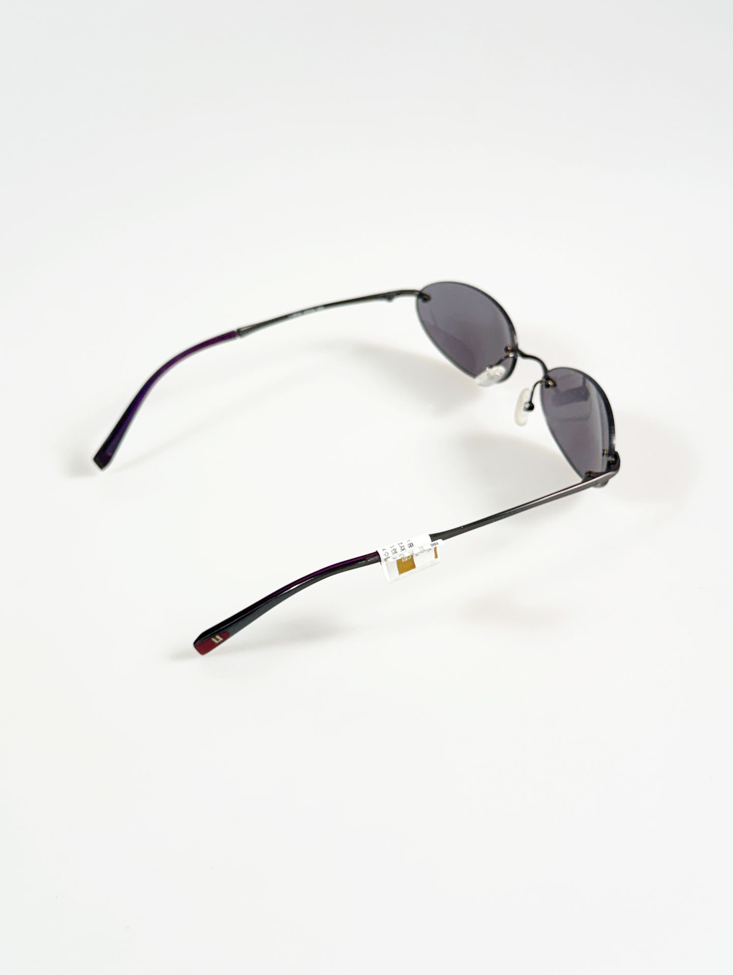 SILVIO VALENCIA Smoke Oval Rimless Metal Sunglasses