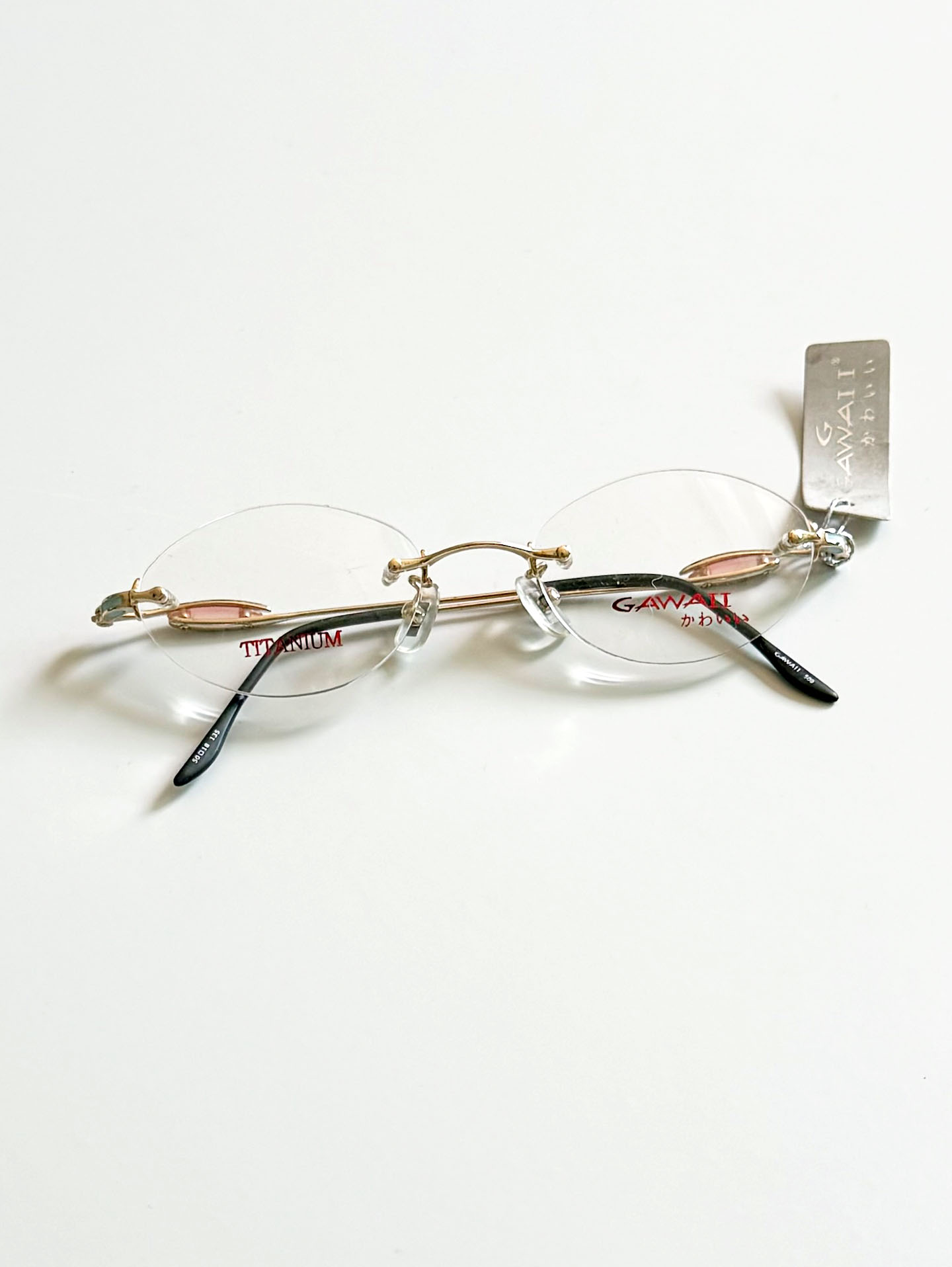 GAWAII Gold Rimless Oval Titanium Frame Glasses
