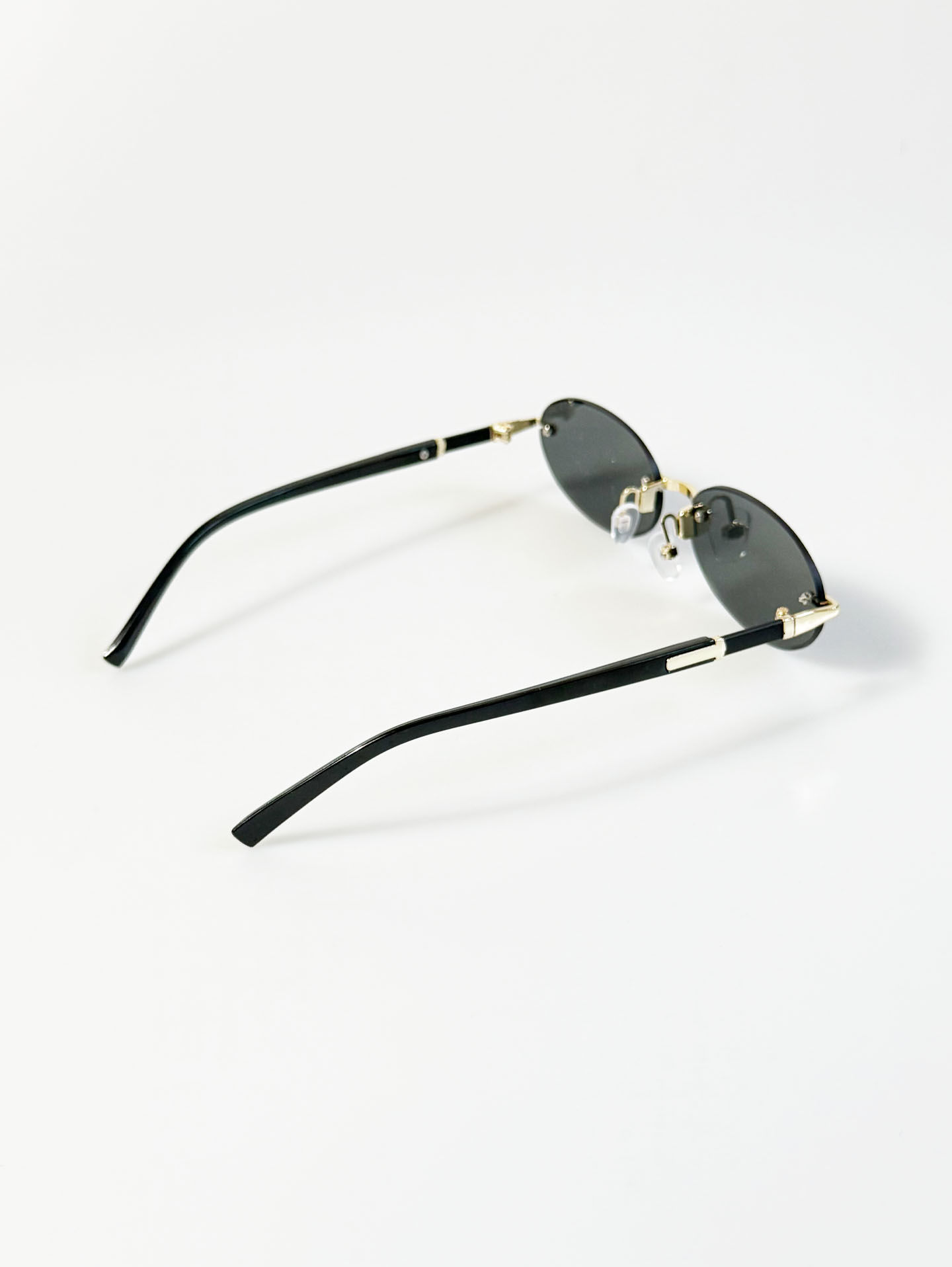 Rimless Oval Gold Metal Frame Smoke Gray Lens Sunglasses