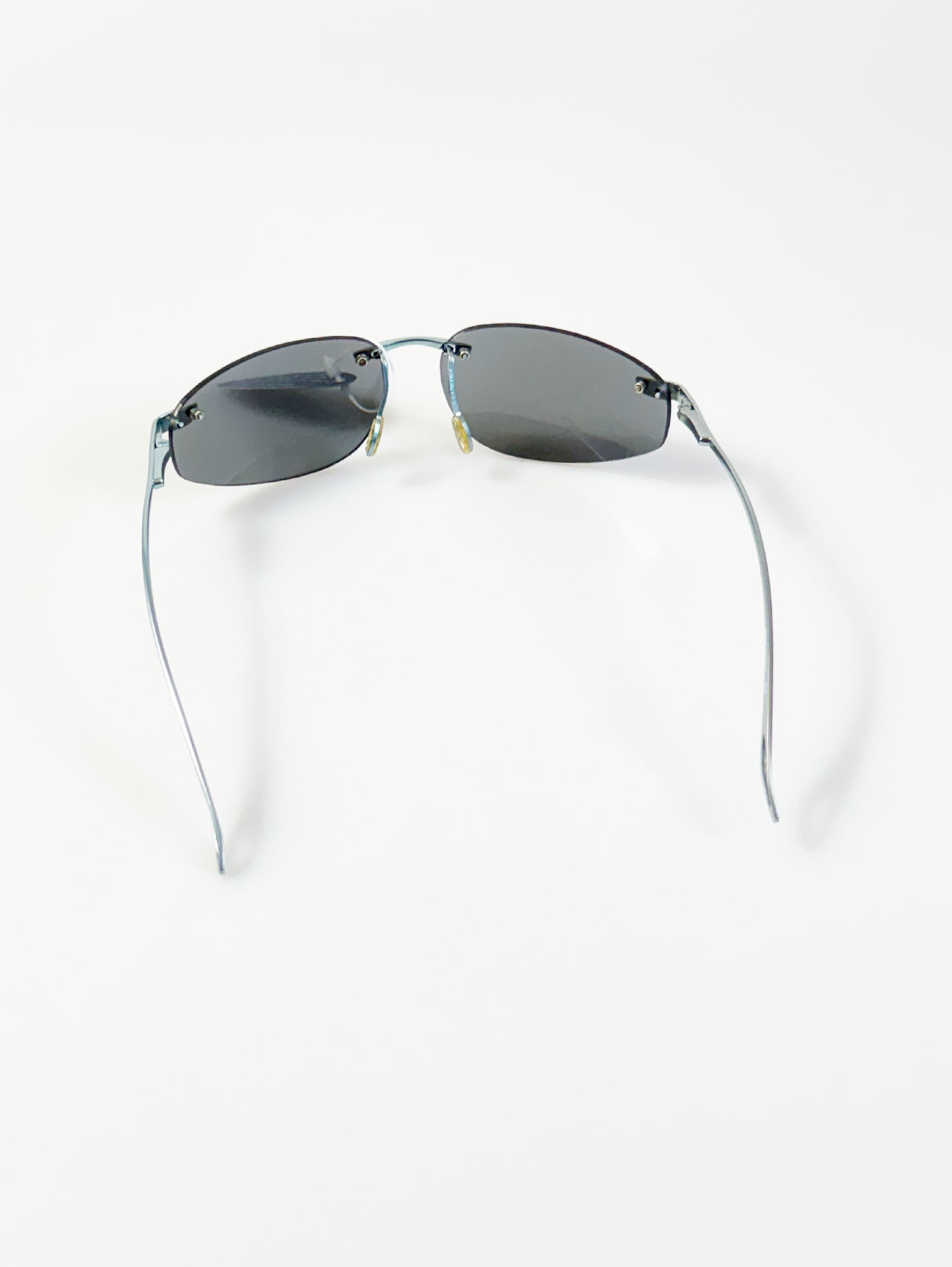 90s OKAY EYEWEAR Rimless Wraparound Blue Gray Metal Sunglasses