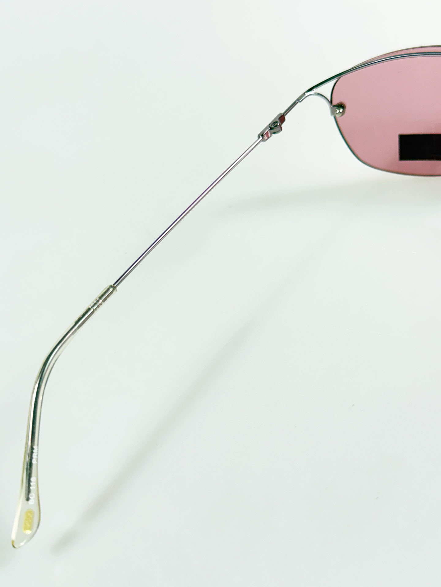 BCBGMAXAZRIA Slim Oval Rimless Metal Tint Sunglasses