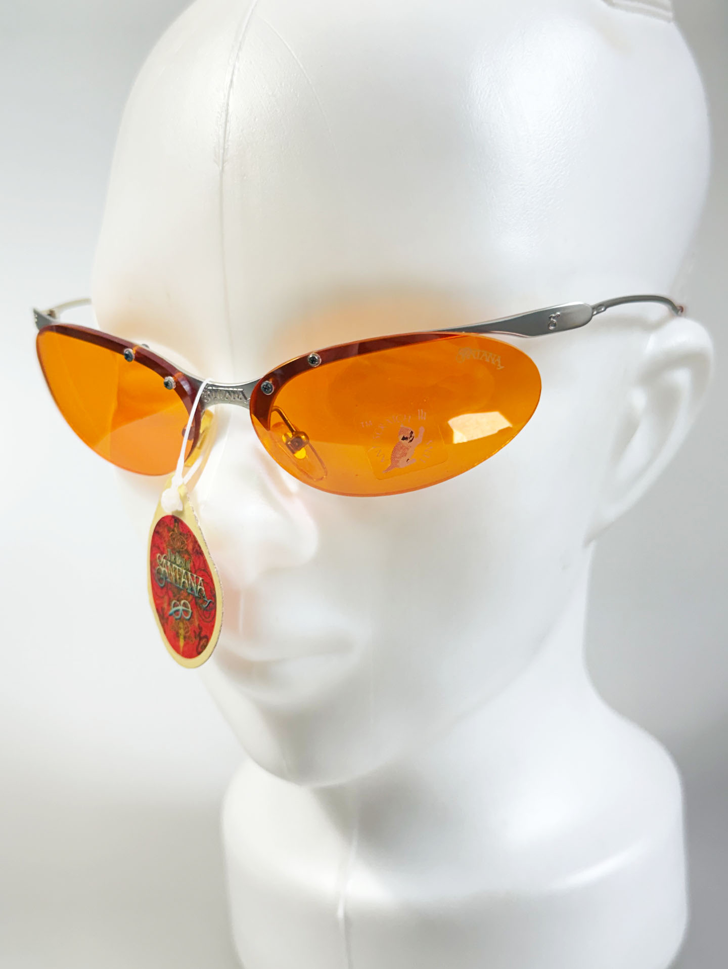 90's SANTANA Silver Rimless Oval Metal Orange Tint Sunglasses