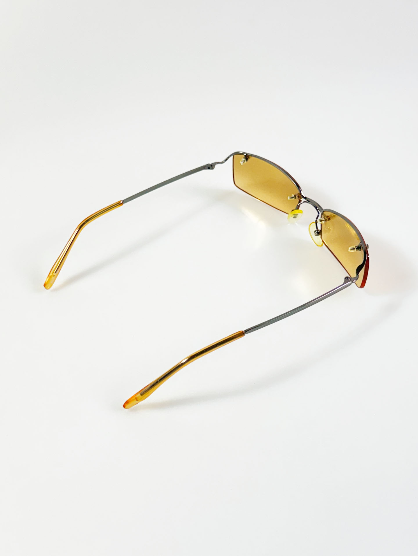 CAPRIO Gunmetal Rimless Square Tint Sunglasses