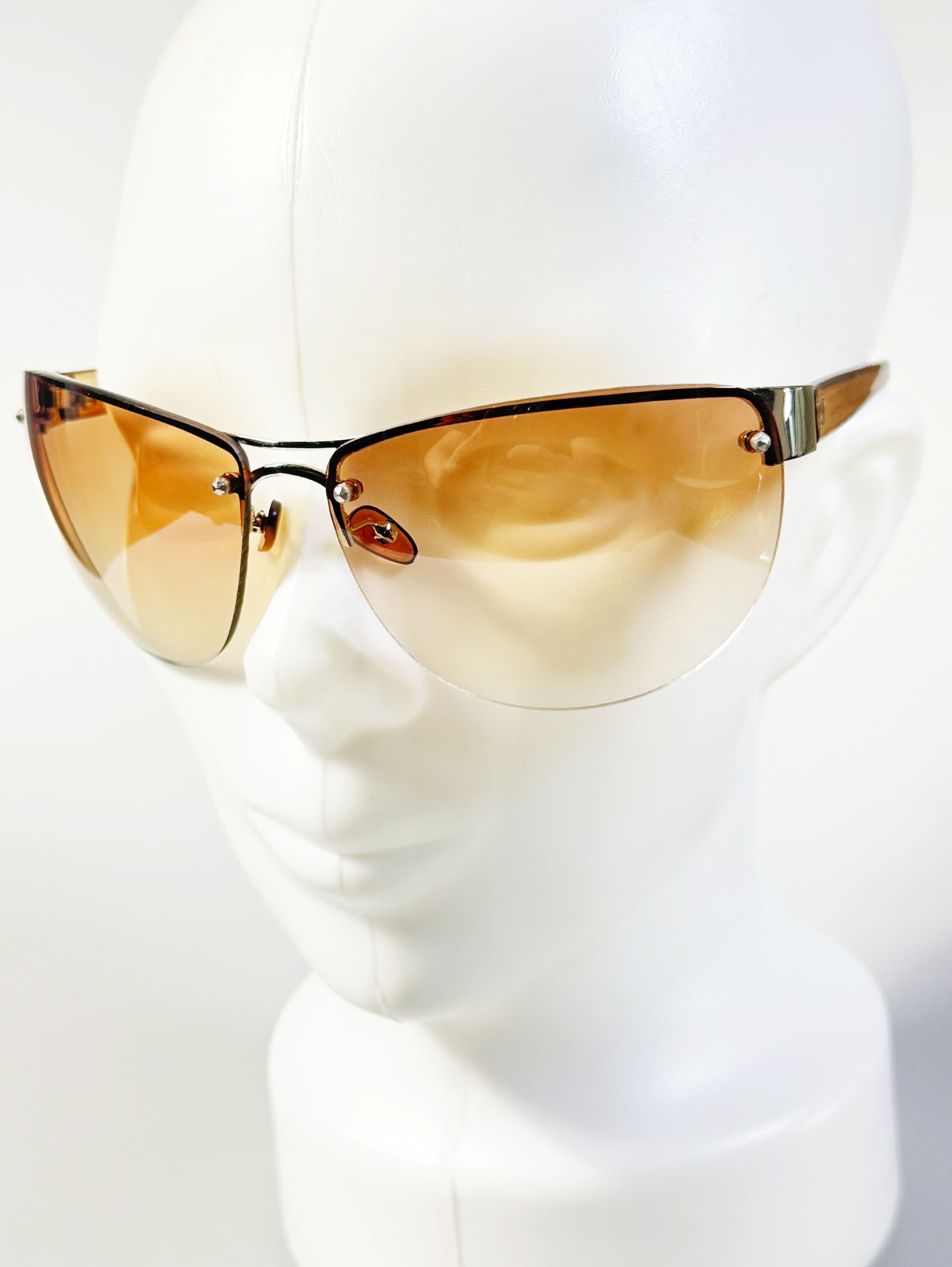 Wraparound Shield Rimless Metal Frame Tinted Sunglasses