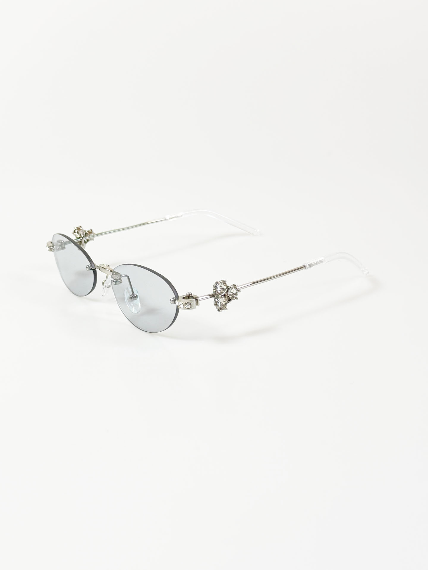 Crystal Detail Rimless Oval Silver Metal Frame Sunglasses