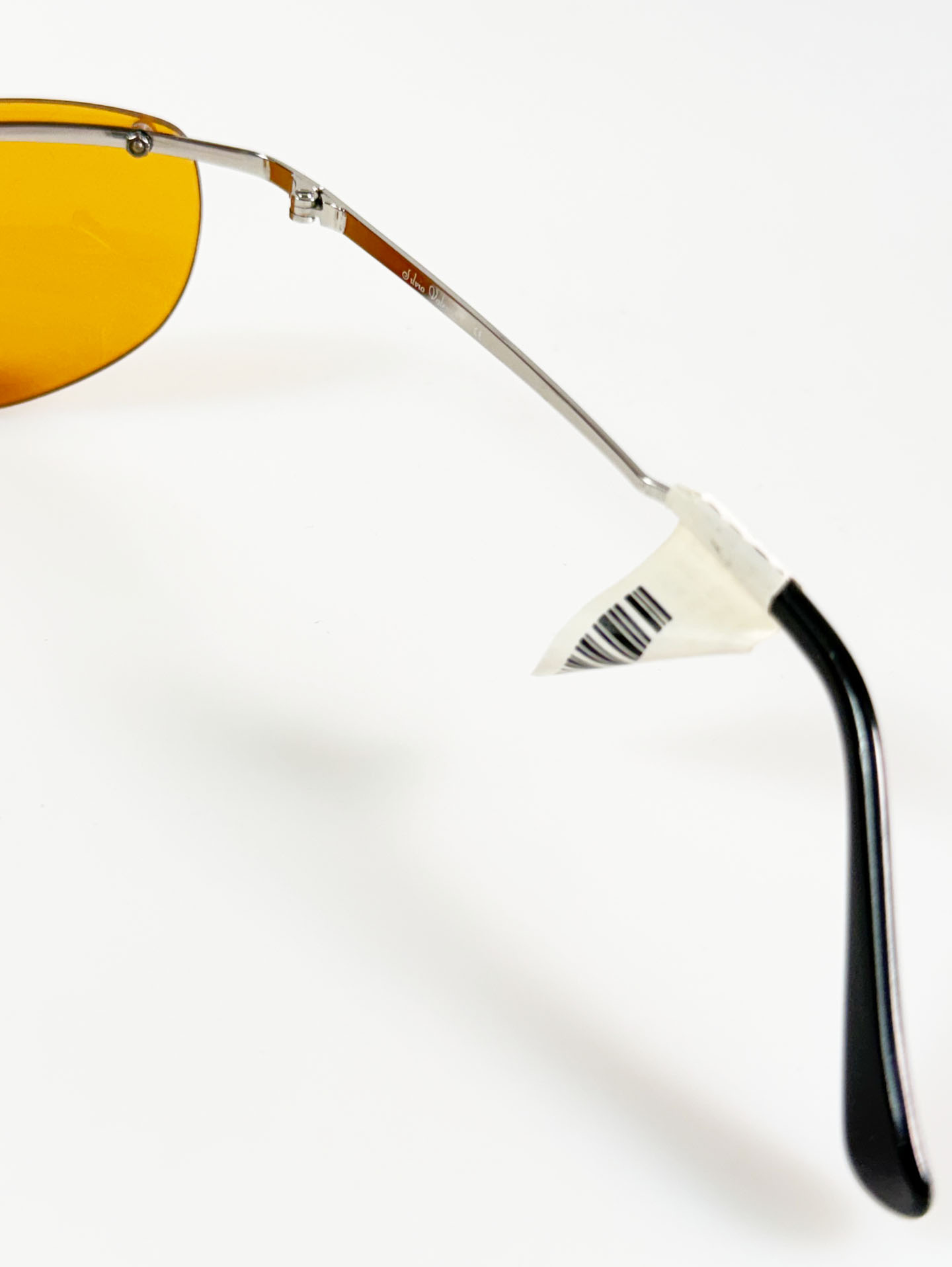 SILVIO VALENCIA Silver Rimless Oval Metal Orange Tint Sunglasses