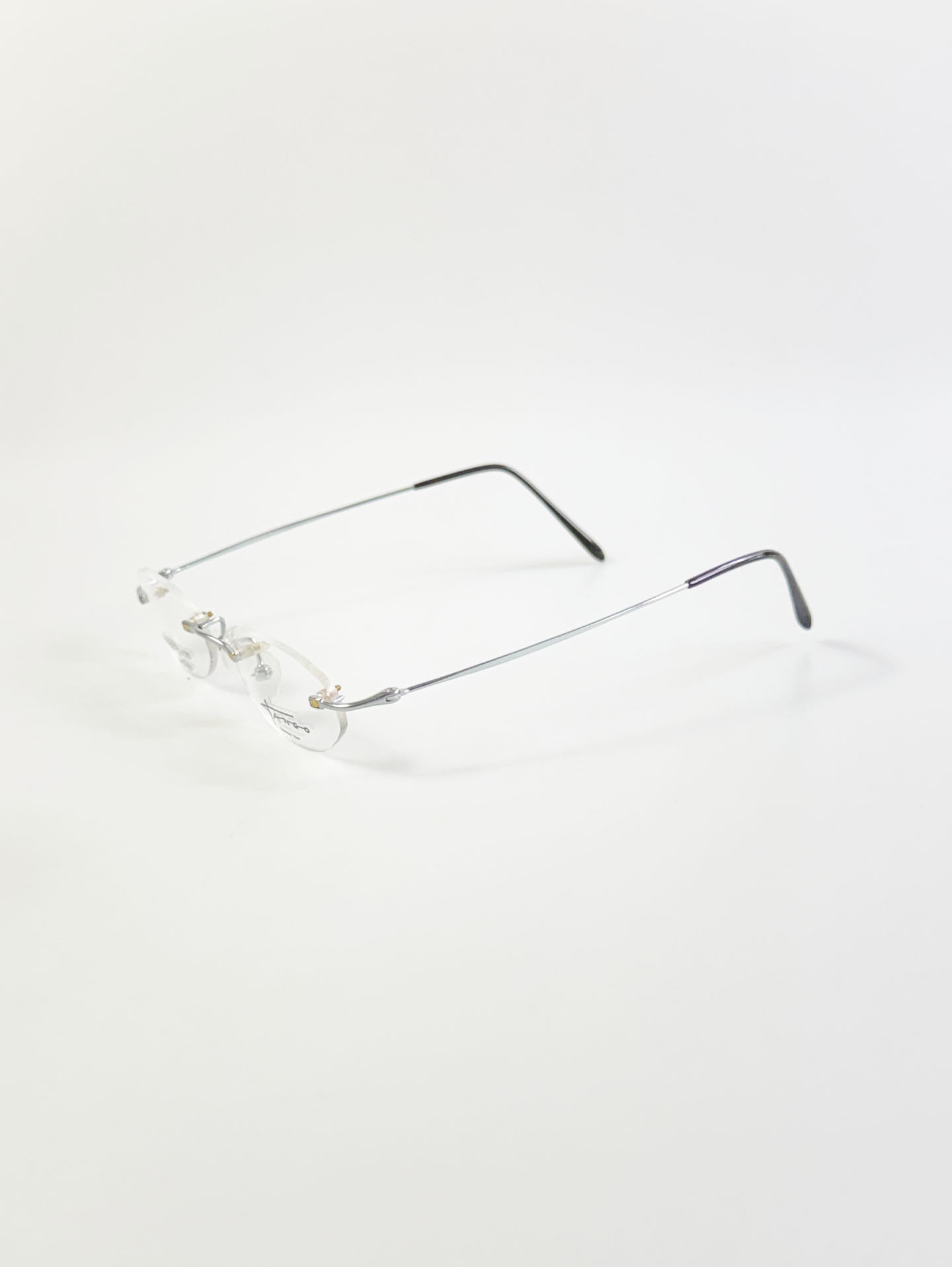 Tango Silver Oval Rimless Metal Glasses