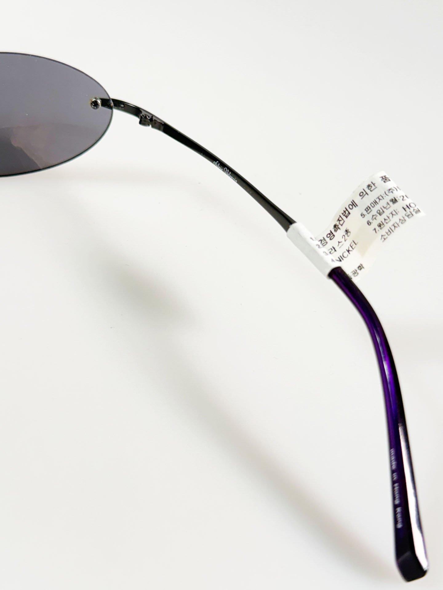 SILVIO VALENCIA Smoke Oval Rimless Metal Sunglasses