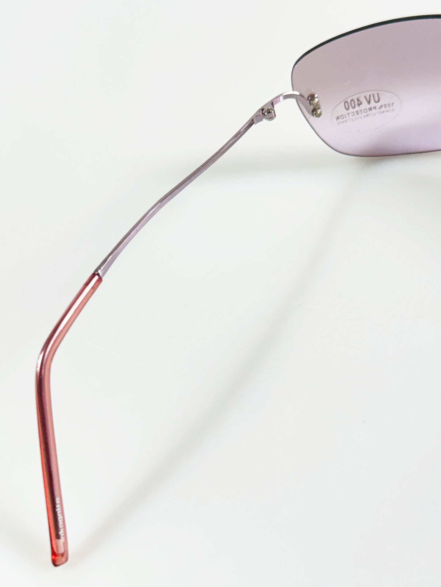 INKOGNITO Silver Rimless Square Tint Sunglasses