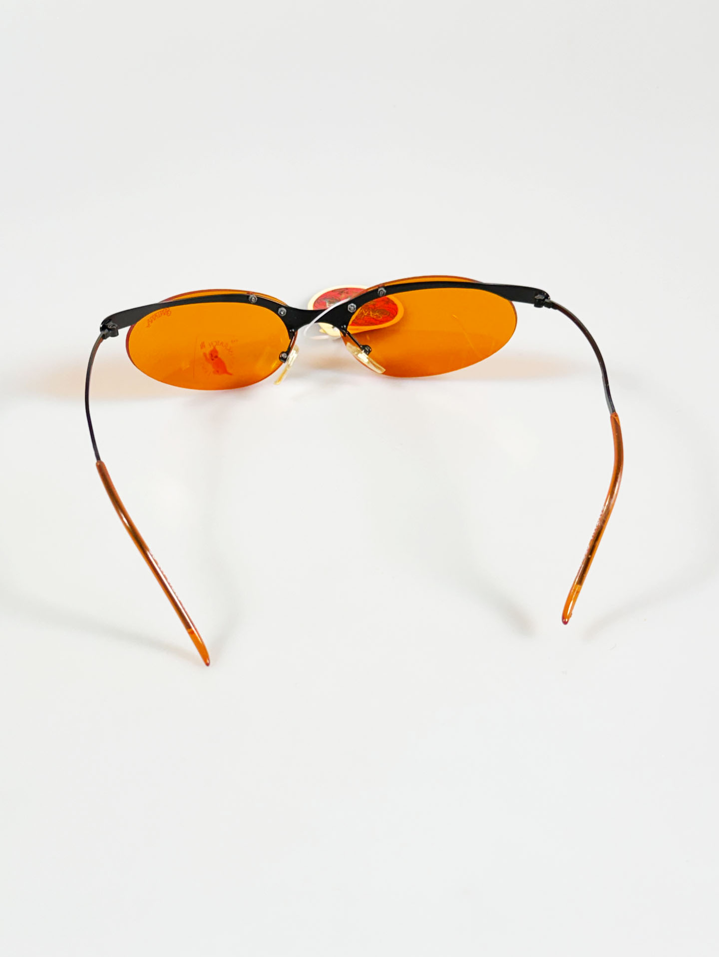 90's SANTANA Gunmetal Rimless Oval Orange Tint Sunglasses