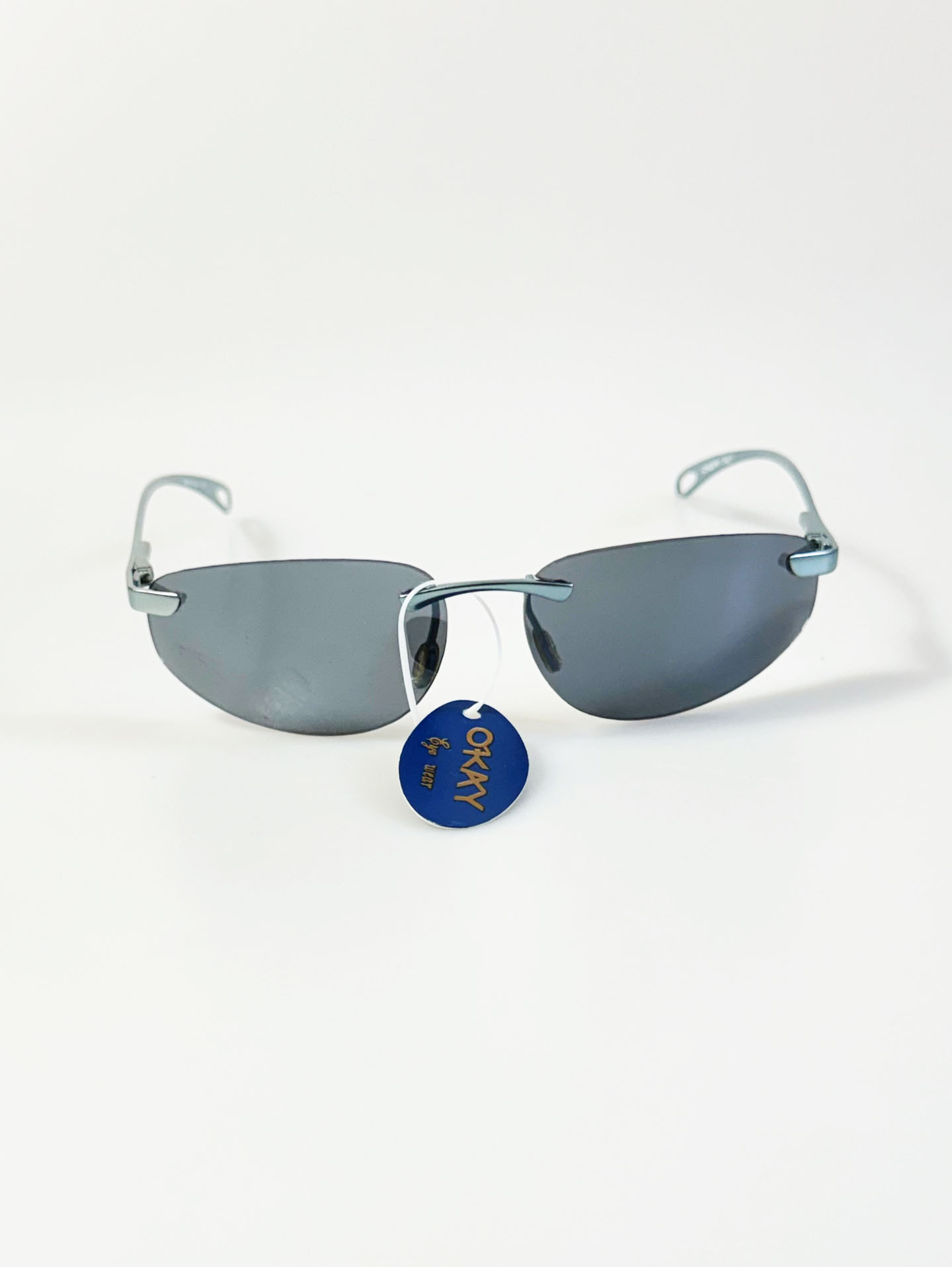 90s OKAY EYEWEAR Rimless Wraparound Blue Gray Metal Sunglasses
