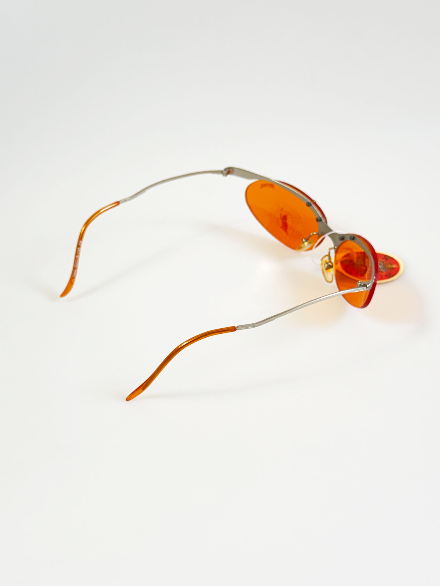 90's SANTANA Silver Rimless Oval Metal Orange Tint Sunglasses