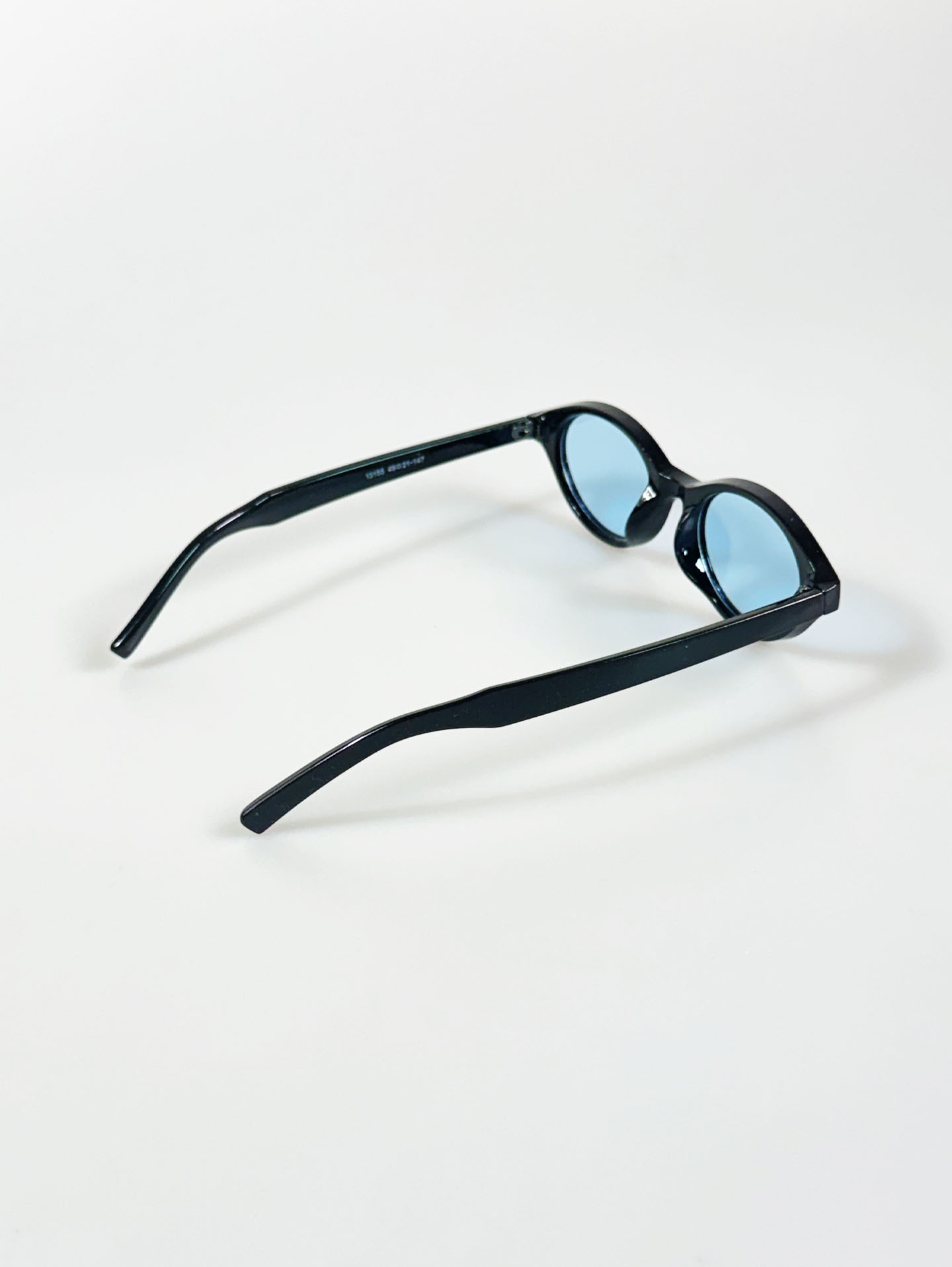 Black Oval Bold Frame Blue Tint Sunglasses