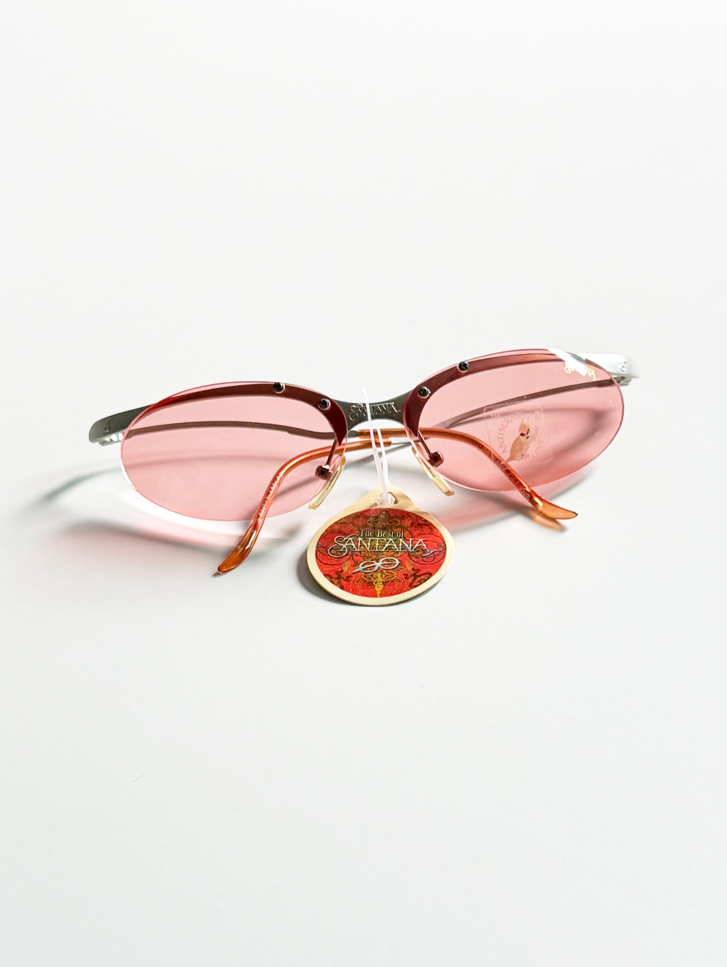 90's SANTANA Silver Rimless Oval Metal Pink Tint Sunglasses