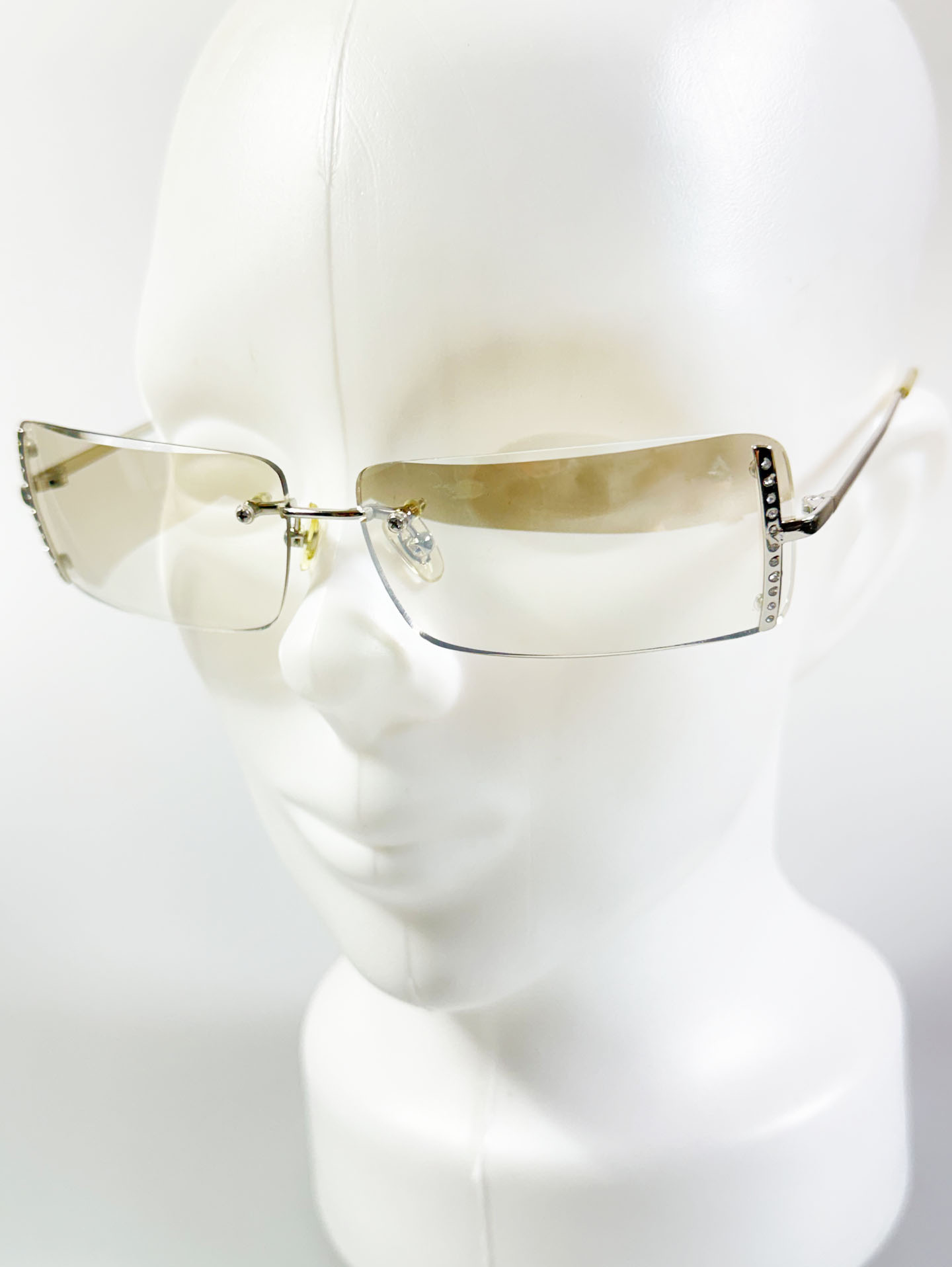 CAPRIO Silver Rimless Square Metal Clear Tinted Sunglasses