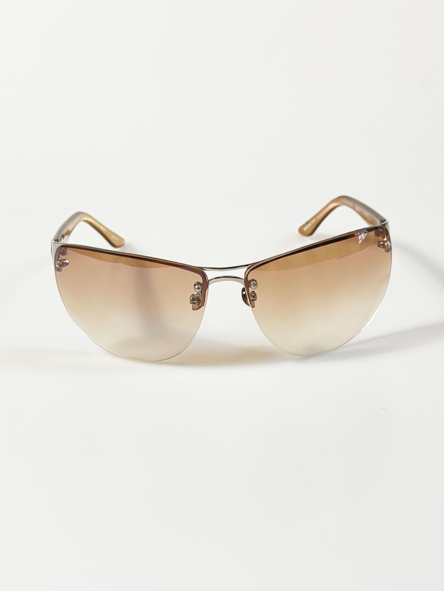 Wraparound Shield Rimless Metal Frame Tinted Sunglasses