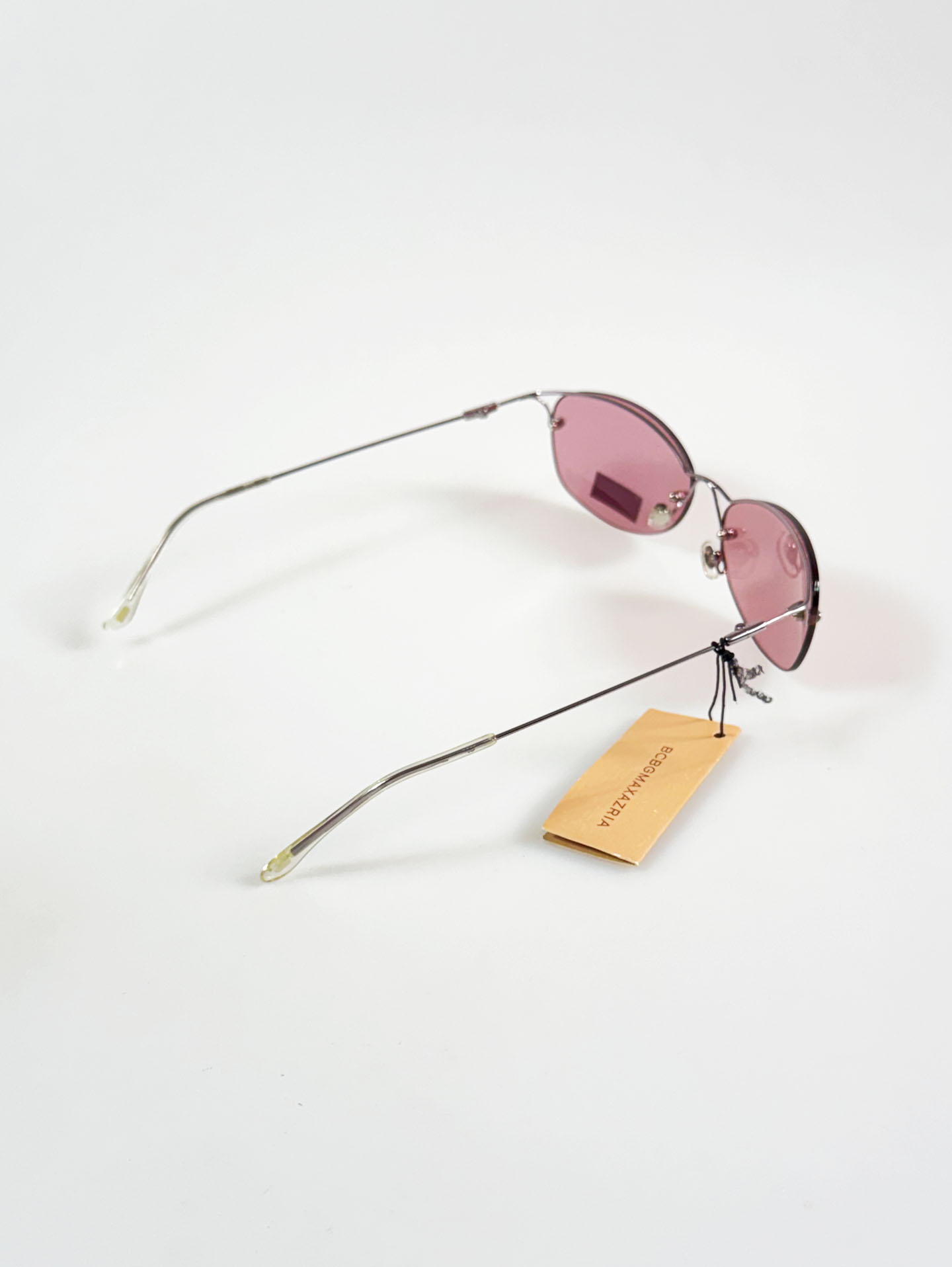 BCBGMAXAZRIA Slim Oval Rimless Metal Tint Sunglasses