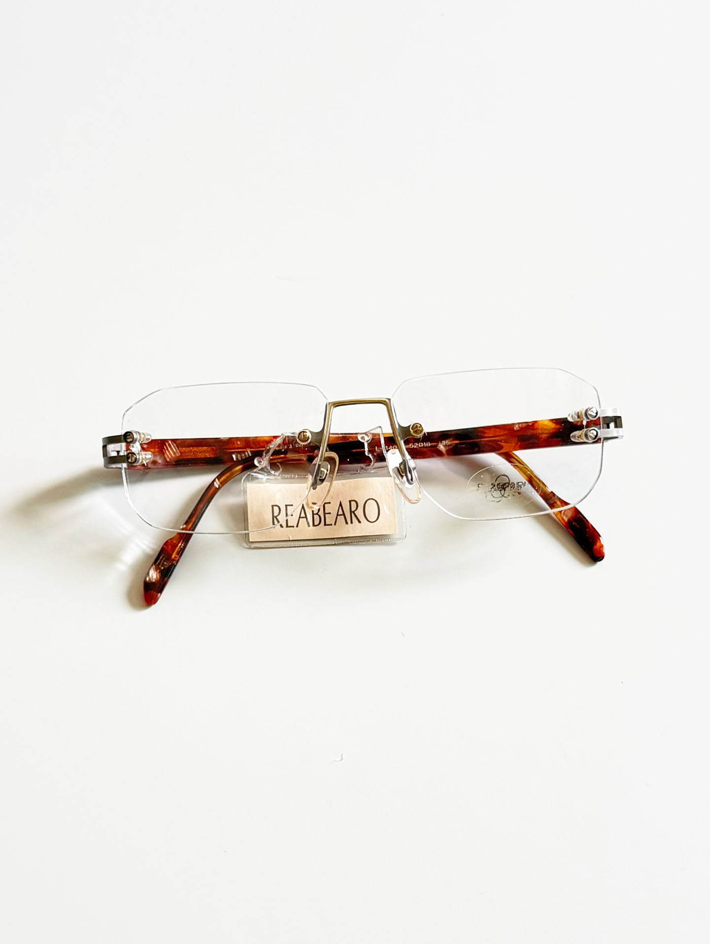 REABEARO Silver Rimless Square Metal Frame Glasses