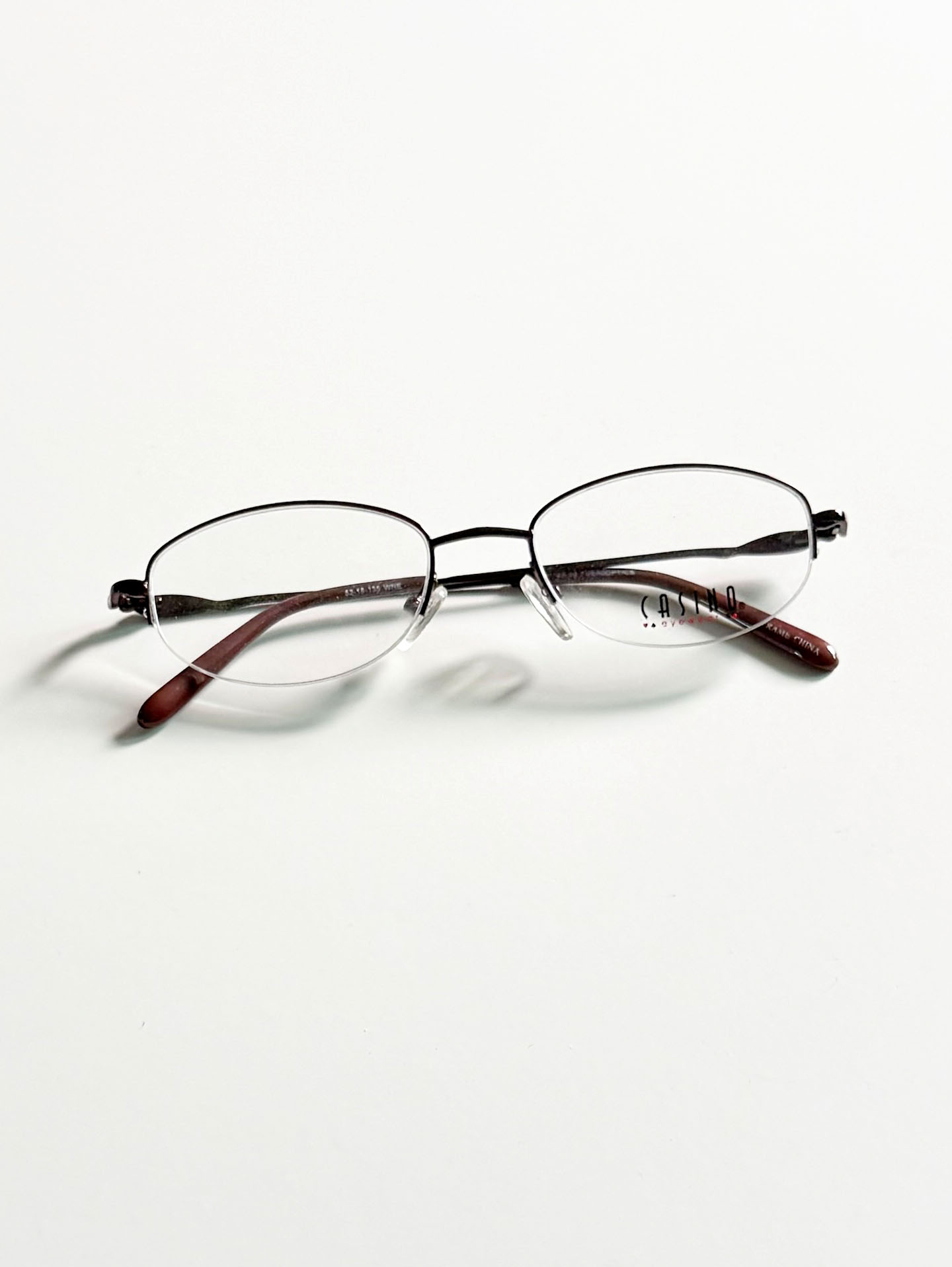 CASINO EYEWEAR Violet Half-Rim Oval Metal Glasses