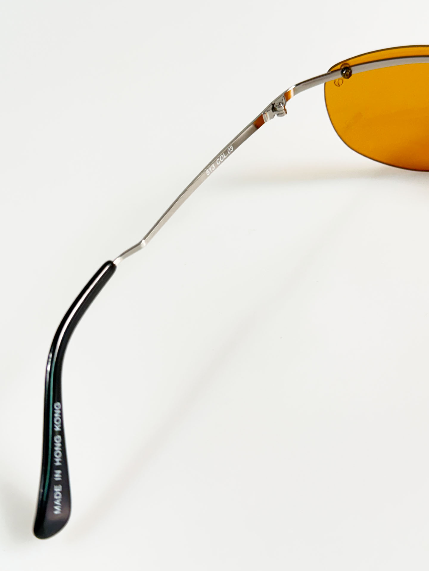 SILVIO VALENCIA Silver Rimless Oval Metal Orange Tint Sunglasses