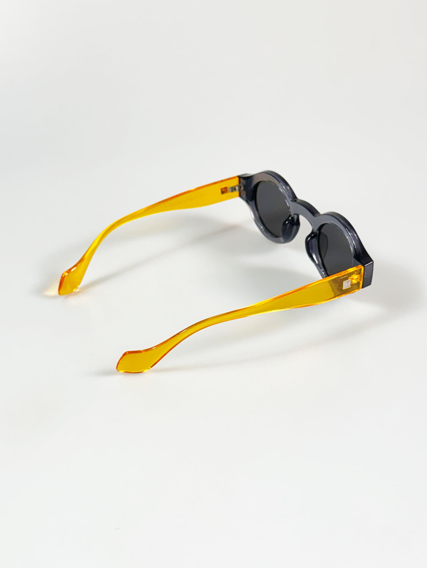 Smoke Gray & Amber Two-Tone Bold Round Sunglasses