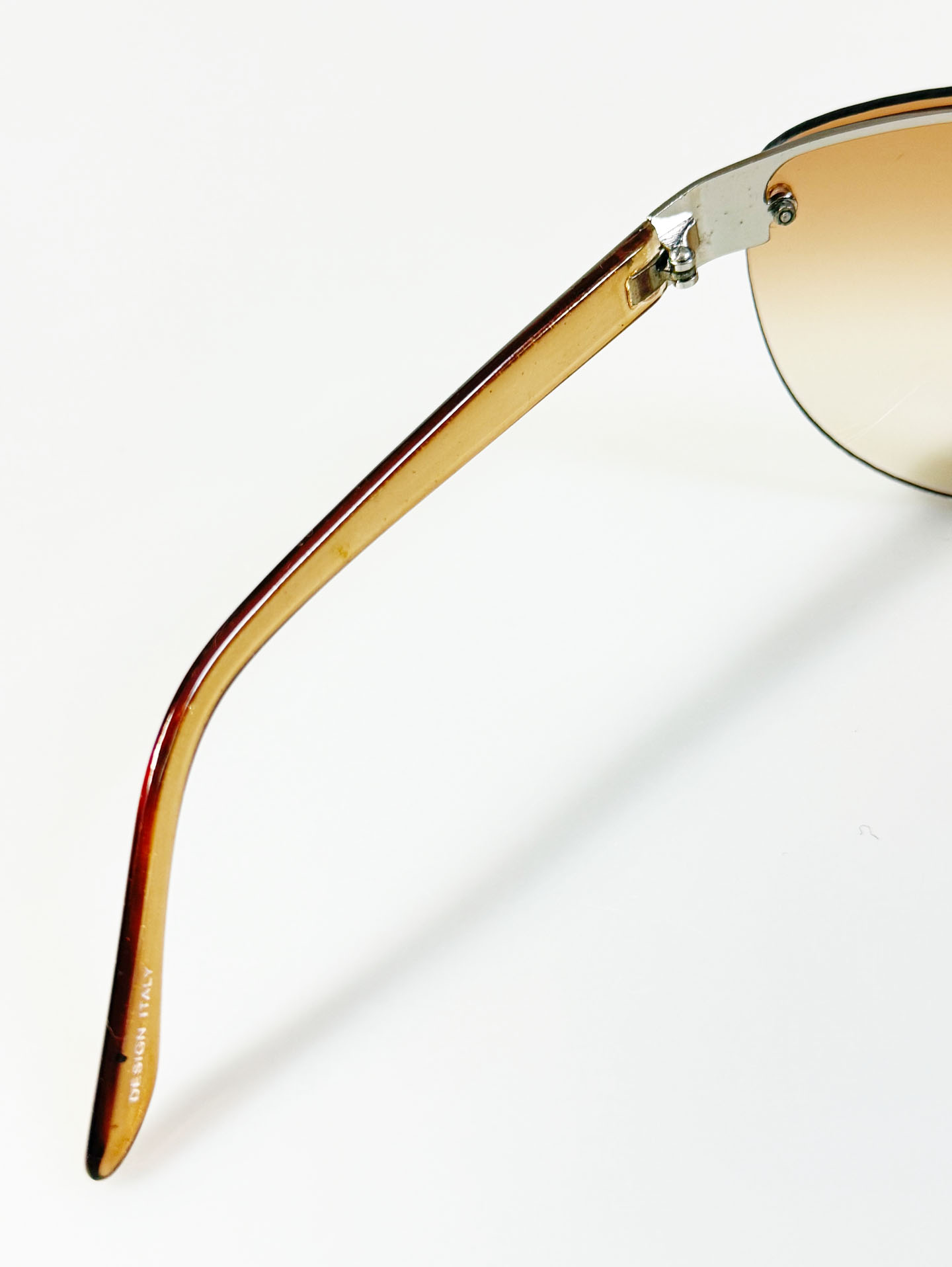 Wraparound Shield Rimless Metal Frame Tinted Sunglasses