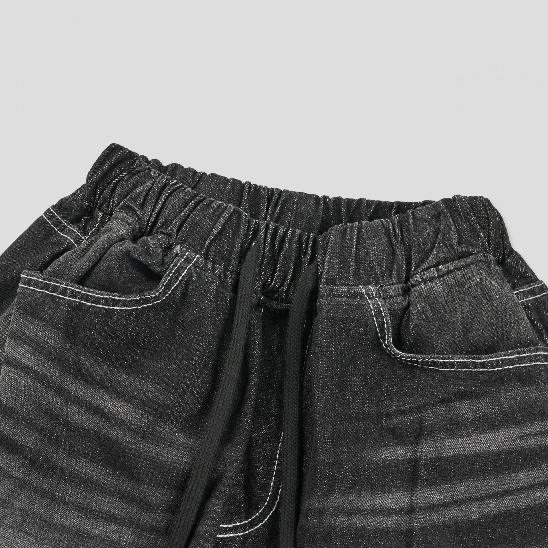 white stitch black denim pants