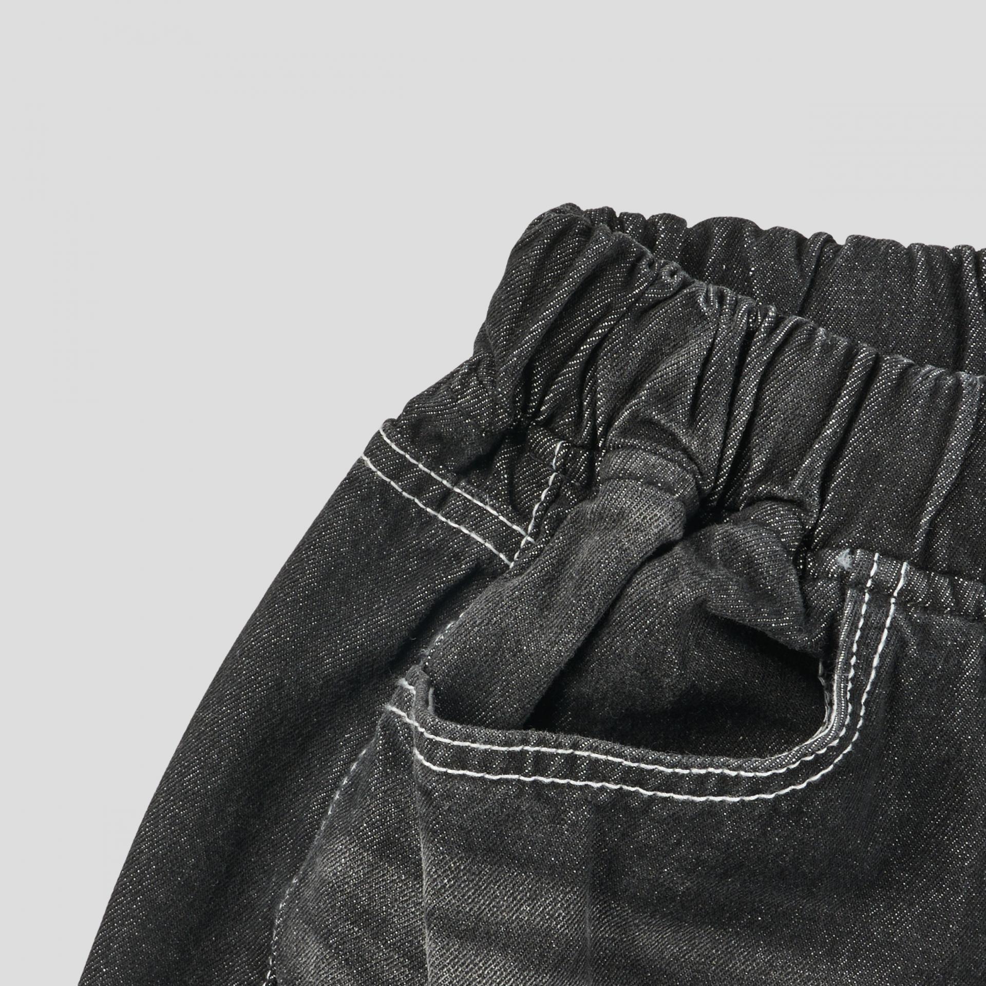 white stitch black denim pants