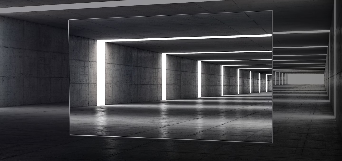 베젤이 거의 없는 모습을 어두운 터널을 통해 보여주고 있습니다.