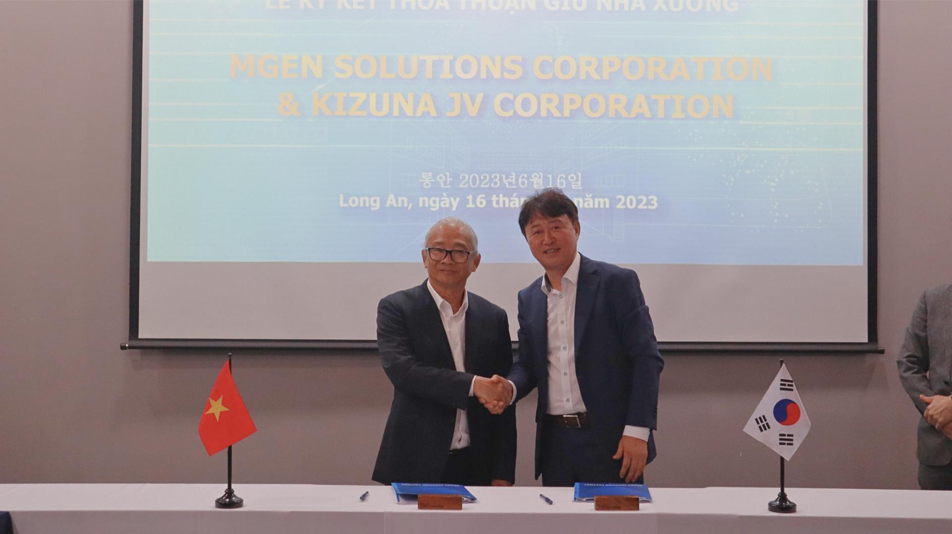 Factory lease agreement signing moment