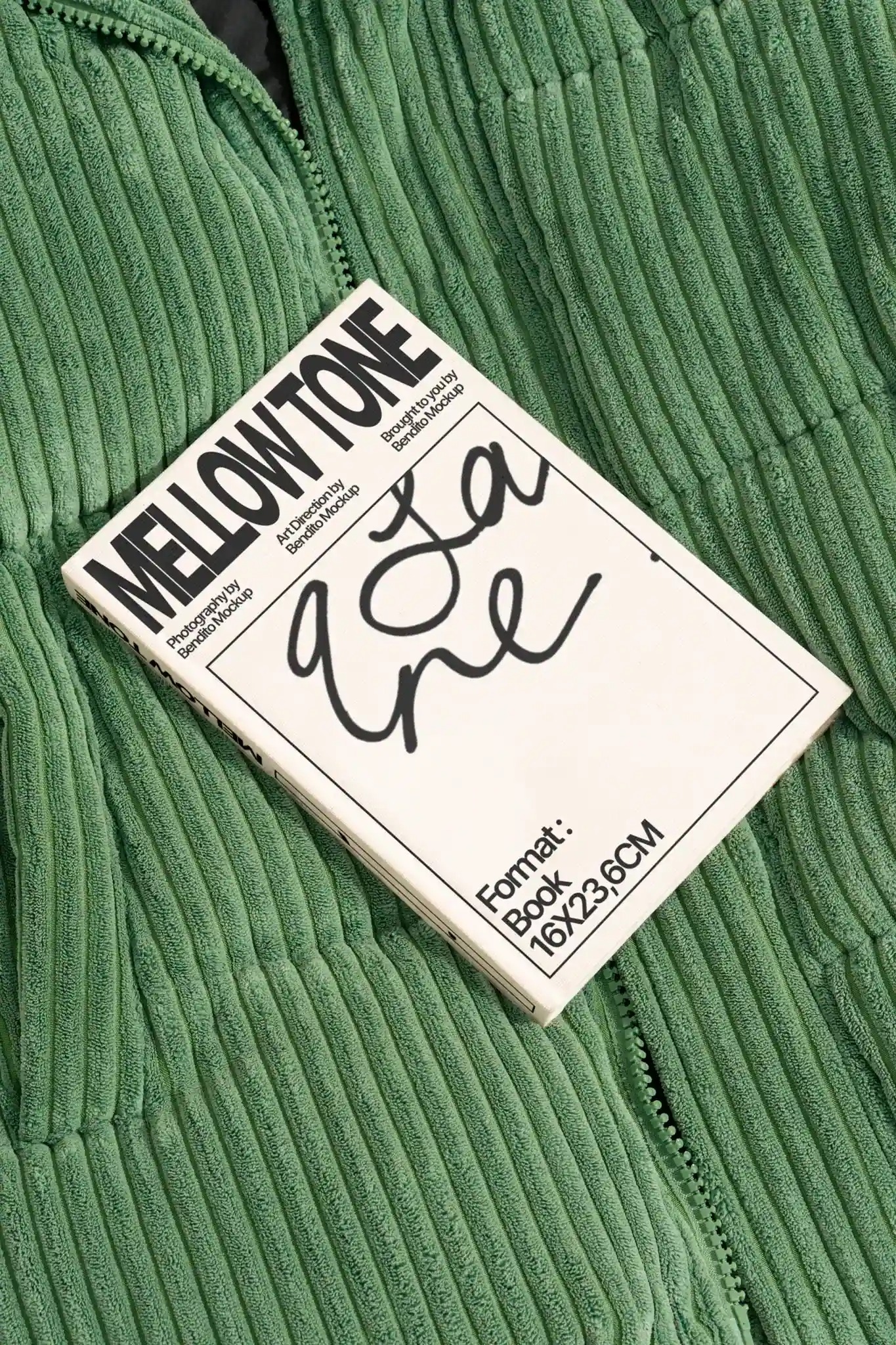 book mockup on a green coat