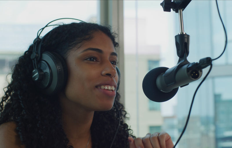 Woman speaking into Q2U microphone