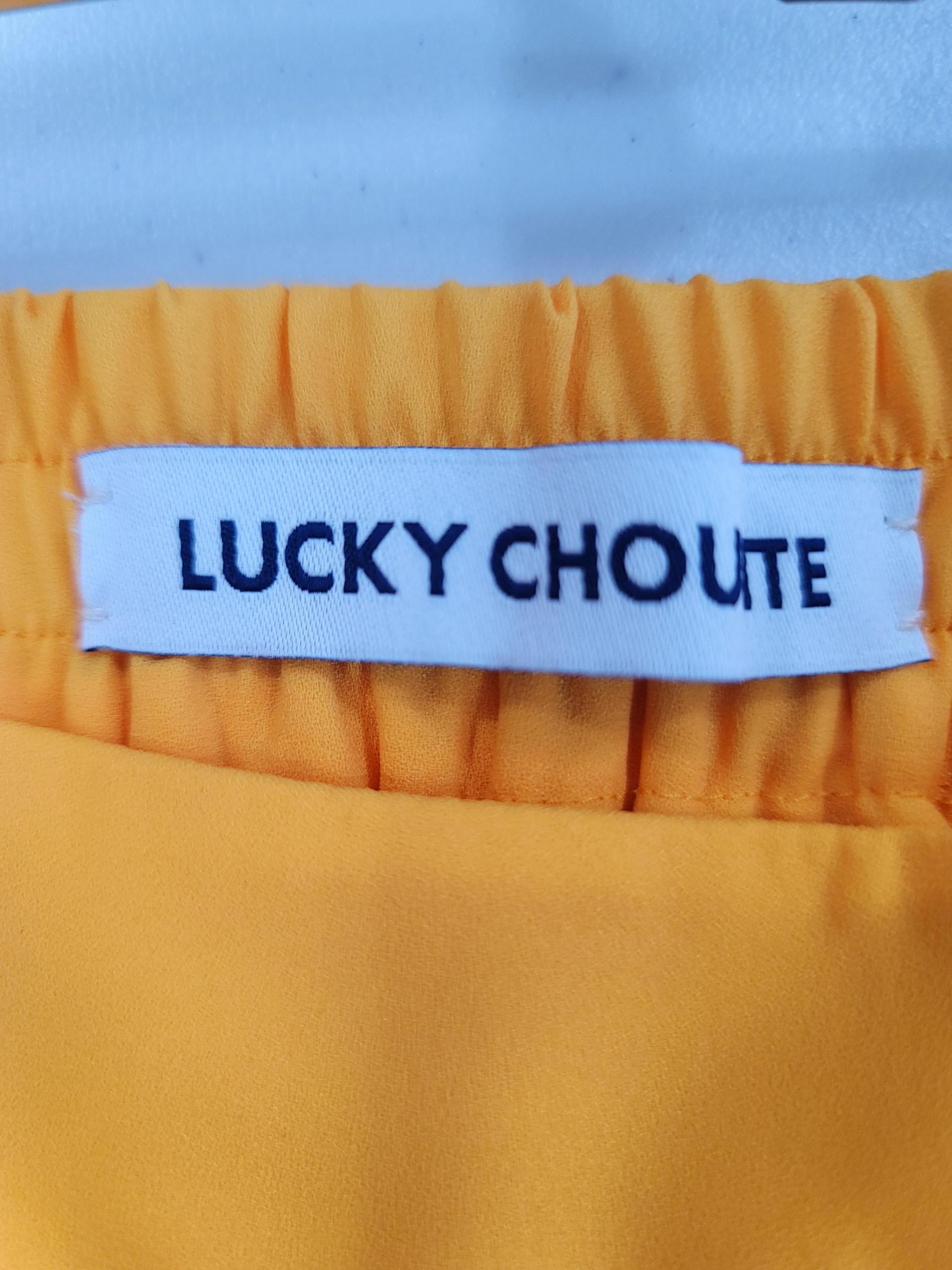 정품 럭키슈에뜨LUCKY CHOUETTE 플리츠 스커트 옐로우/핑크