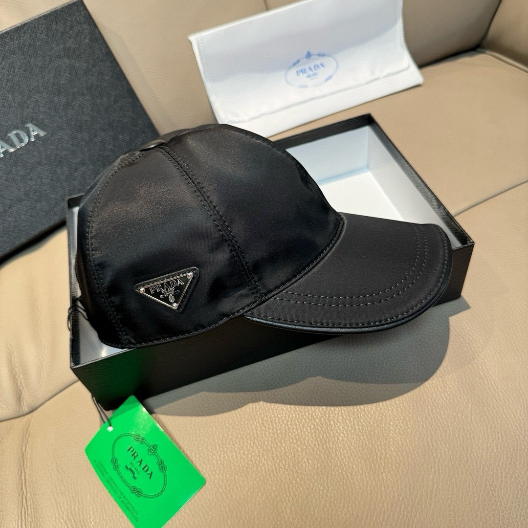 프라다(PRADA) 삼각 로고 나일론 볼캡 모자