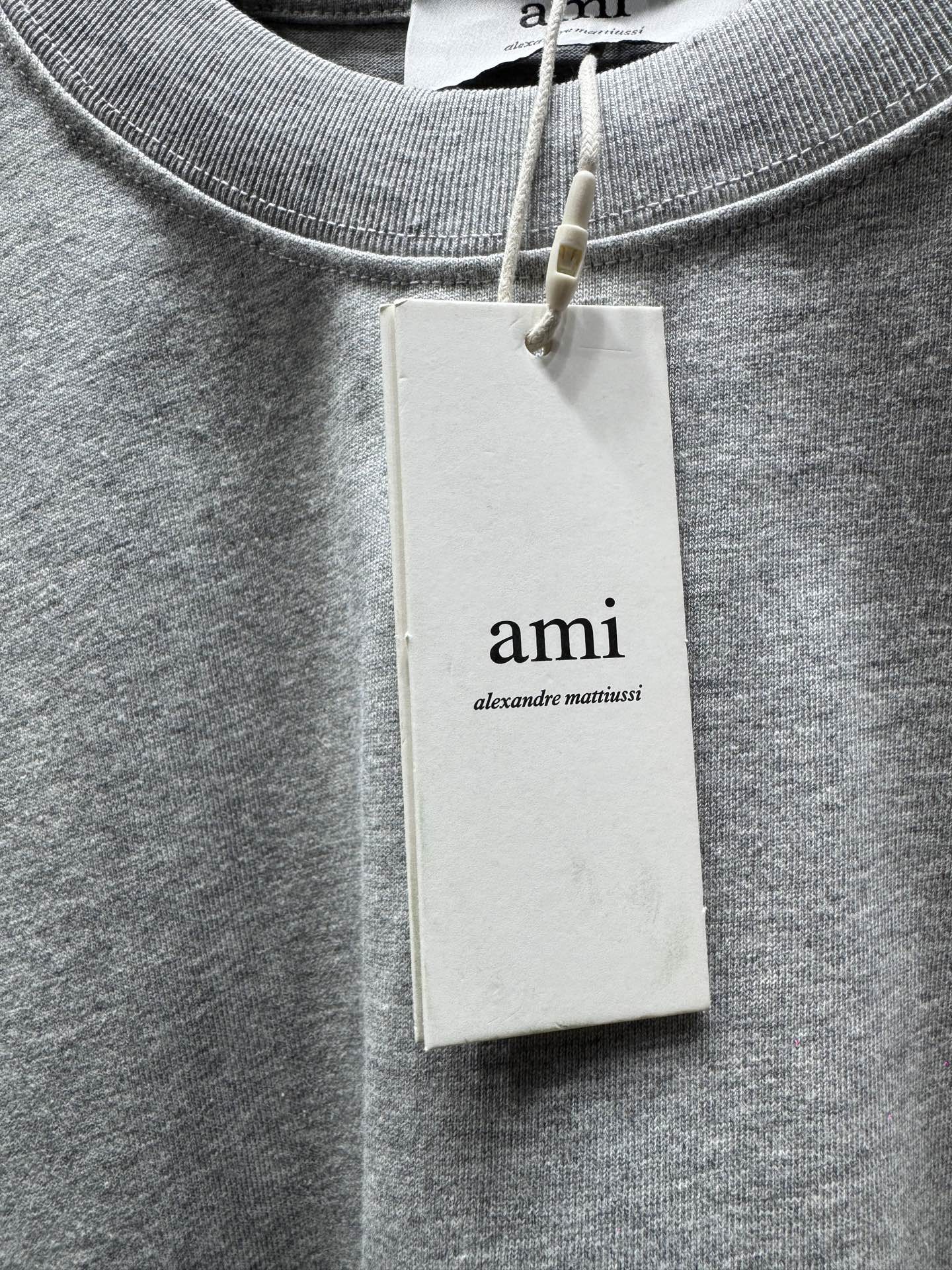 아미(AMI PARIS) 플로킹 하트 반팔 티셔츠 상의 의류