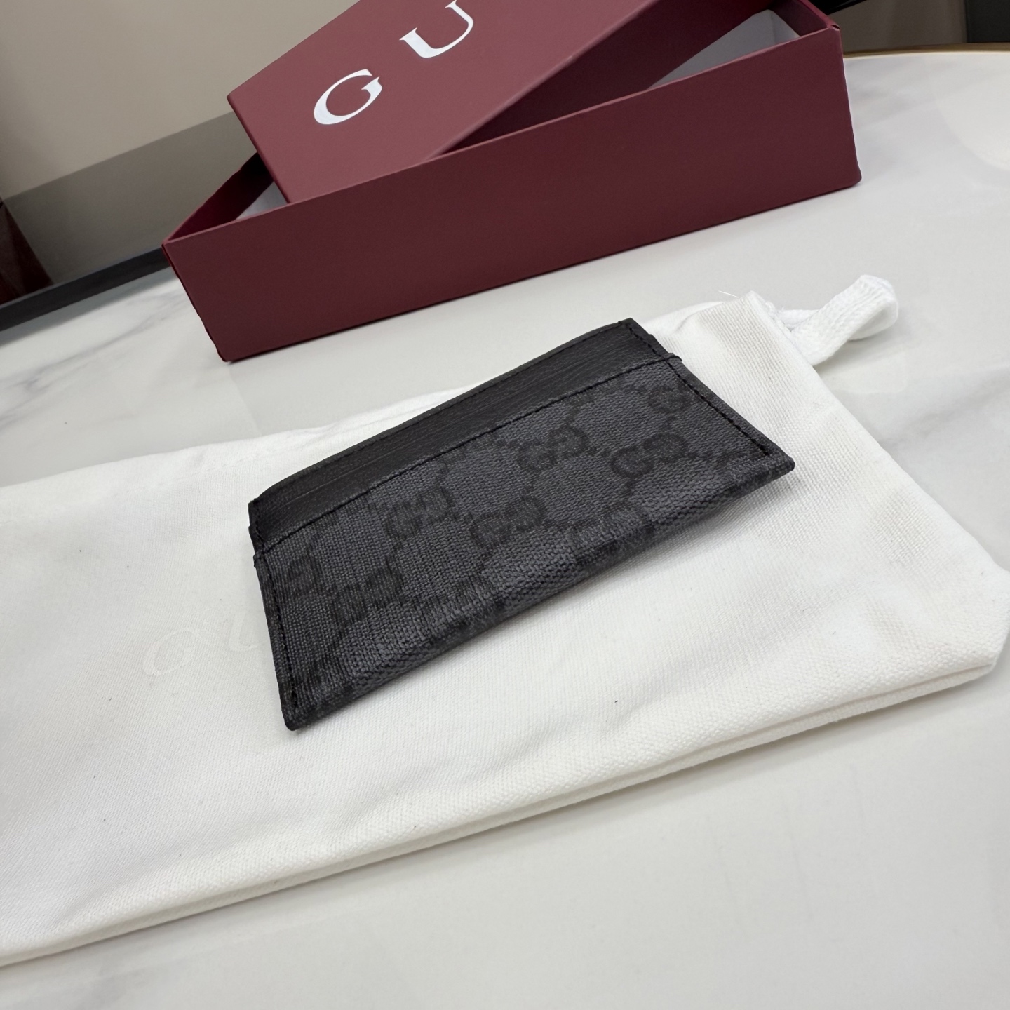 [Gucci] 구찌 (Generation) 에센스 클래식 블랙 GG 수프림 카드 케이스 지갑