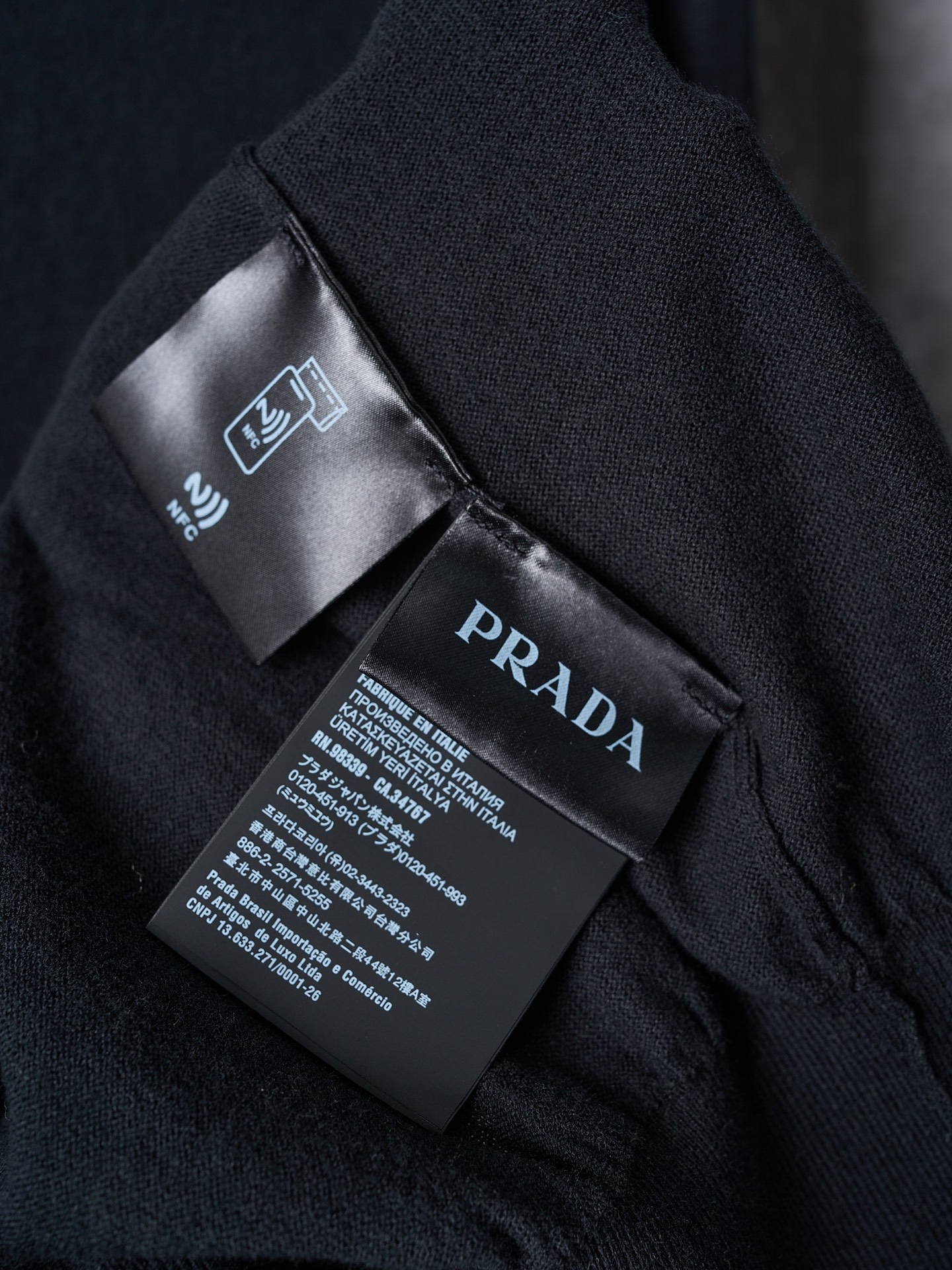 프라다(PRADA) 로고 자카드 터틀넥 울 니트 상의 의류
