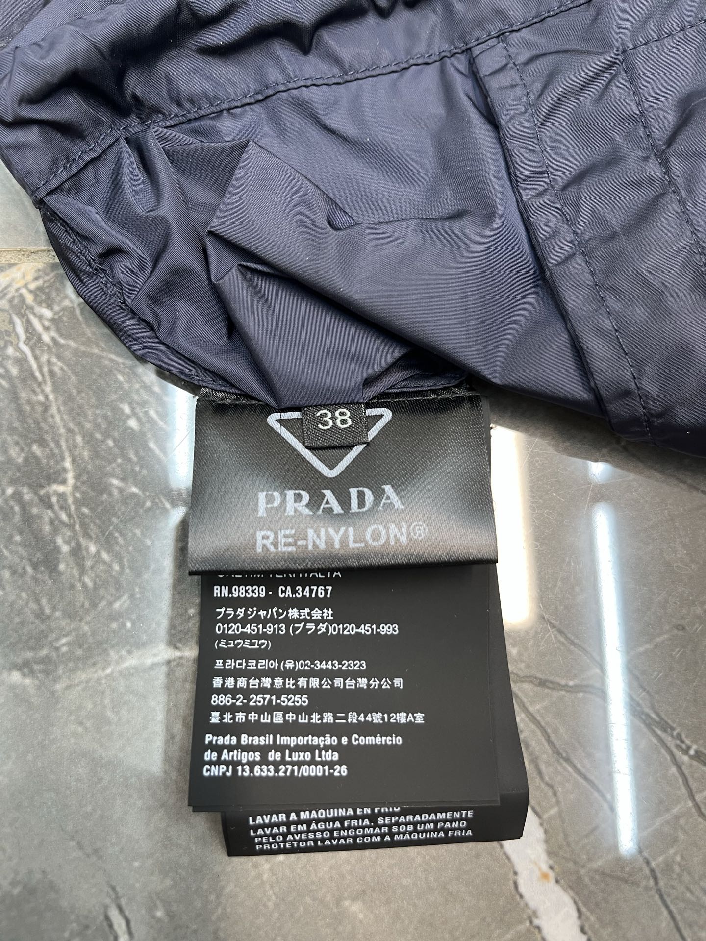 프라다(PRADA) 로고 후드 나일론 재킷 상의 의류