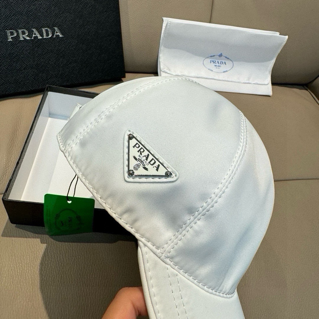 프라다(PRADA) 삼각 로고 나일론 볼캡 모자