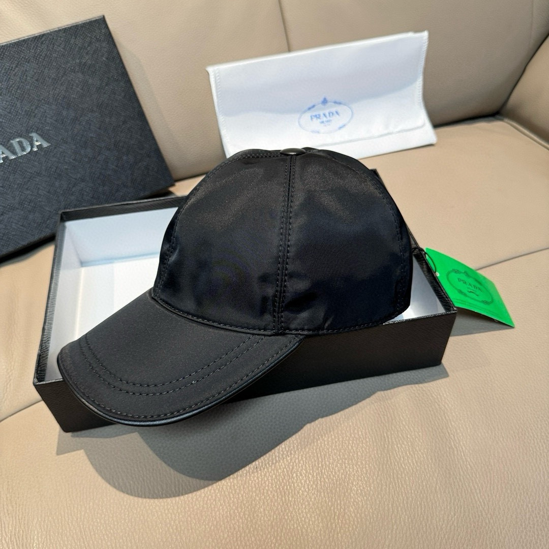 프라다(PRADA) 삼각 로고 나일론 볼캡 모자