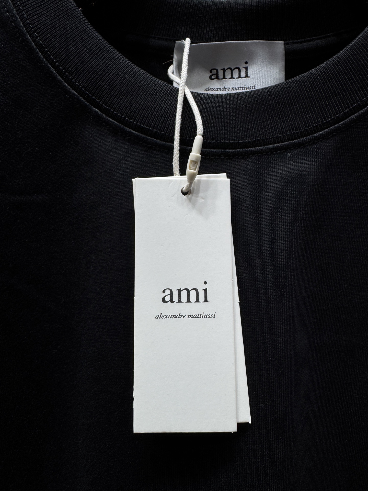 아미(AMI PARIS) 플로킹 하트 반팔 티셔츠 상의 의류