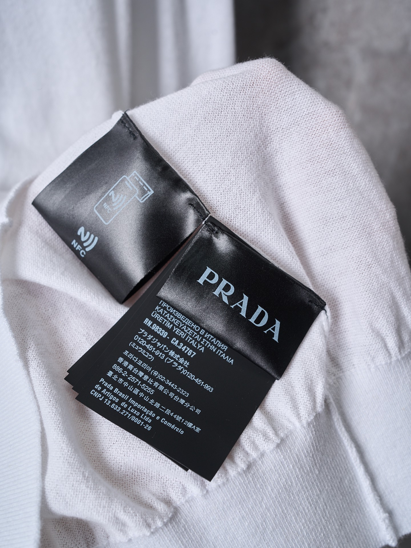 프라다(PRADA) 로고 자카드 터틀넥 울 니트 상의 의류
