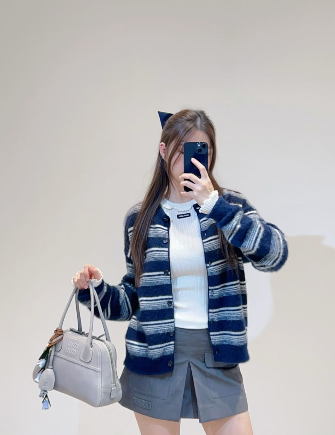 미우미우(MIUMIU) 스트라이프 하프넥 니트 가디건 상의 의류