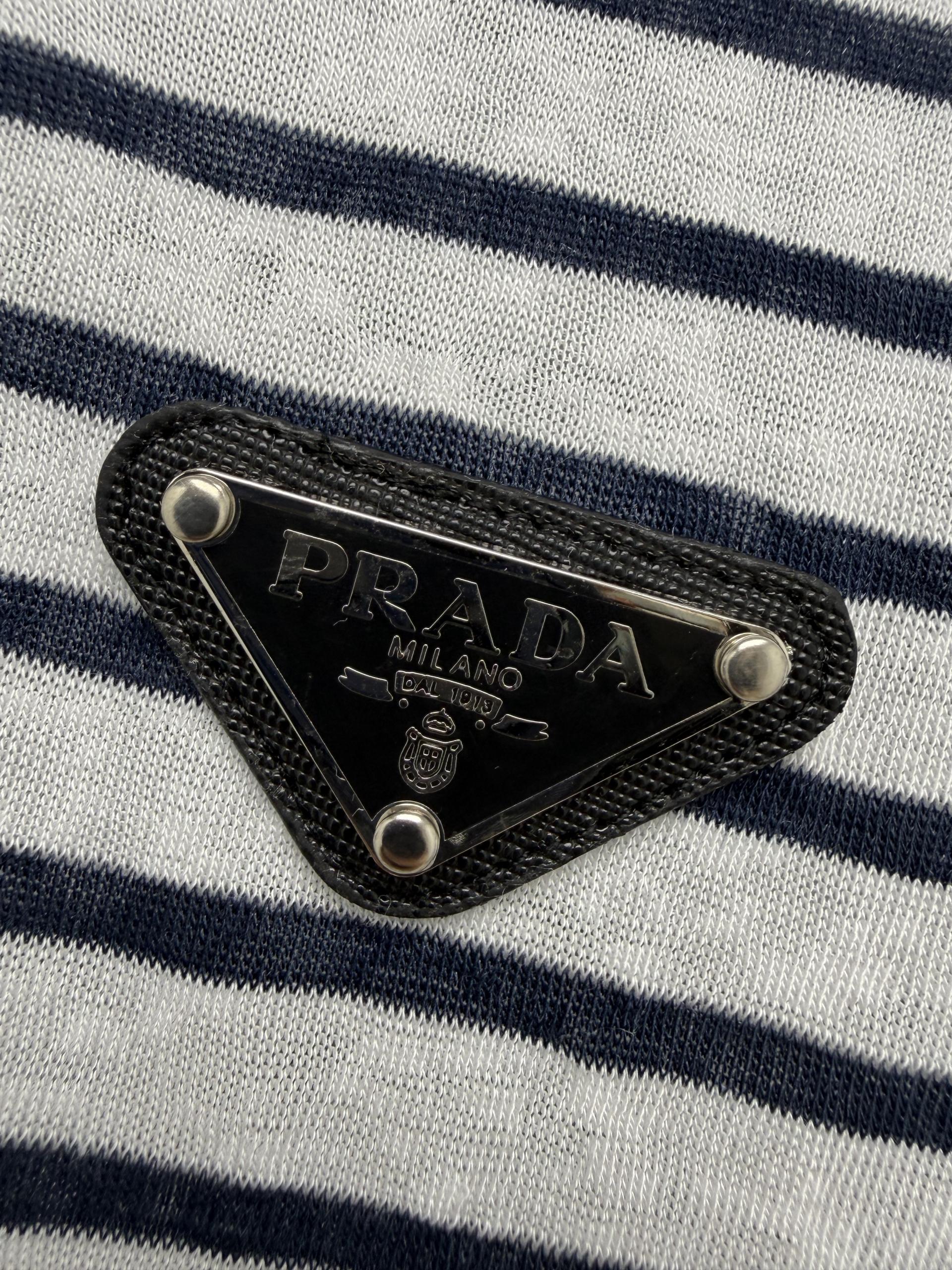 [Prada] 프라다 26SS 백리스 스트랩 반팔 티셔츠 의류