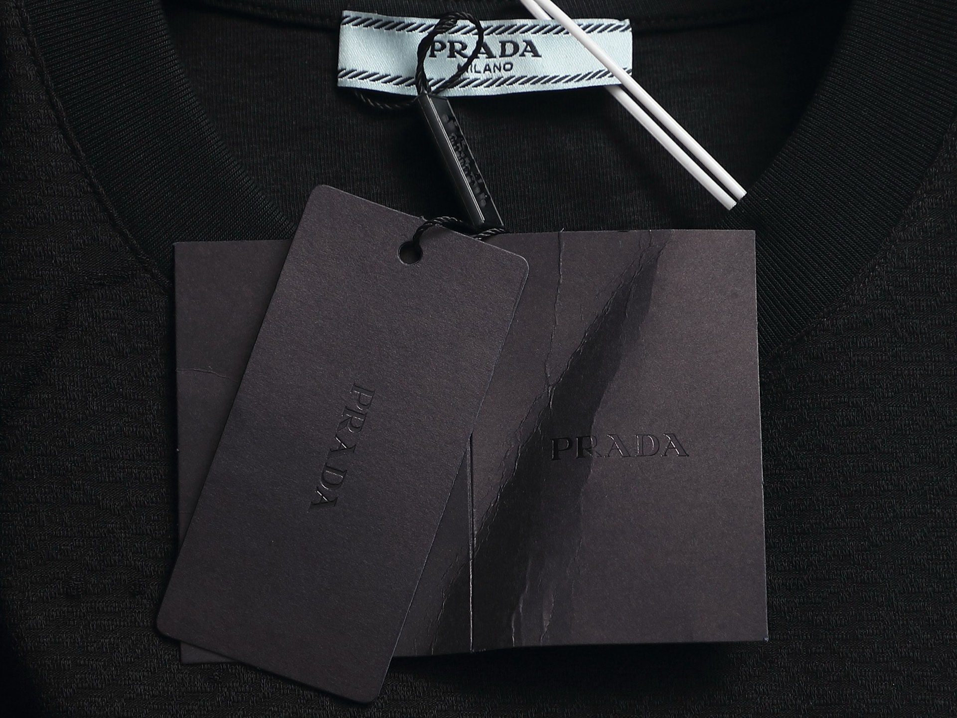 프라다(PRADA) 레터링 로고 삼각 패치 반팔 티셔츠 상의 의류