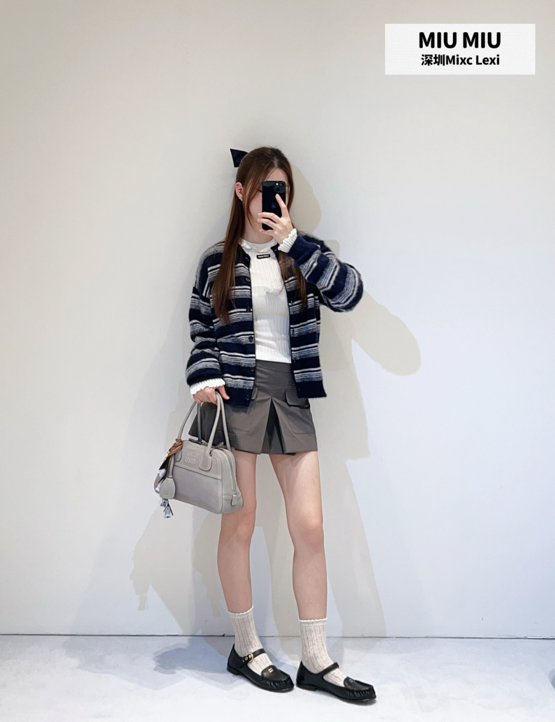미우미우(MIUMIU) 스트라이프 하프넥 니트 가디건 상의 의류