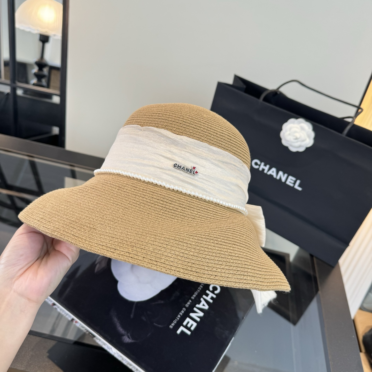 샤넬(CHANEL) 밀짚 선캡 모자
