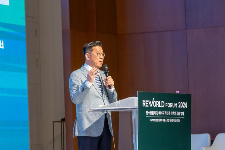Choi Jung-kiu, managing director and partner at Boston Consulting Group, speaks during an opening speech for ReWorld Forum 2024 at HW Convention Center in Seoul, Wednesday. Courtesy of SDX Foundation